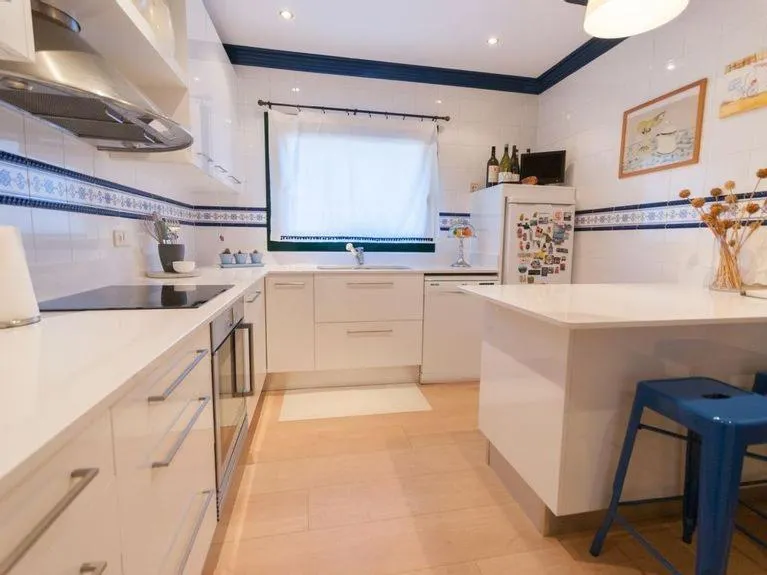 Kitchen or kitchenette in Cozy holiday home with pool in St Pere Pescador