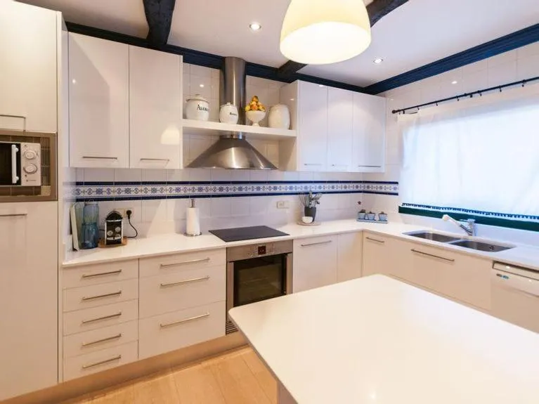 Kitchen or kitchenette in Cozy holiday home with pool in St Pere Pescador