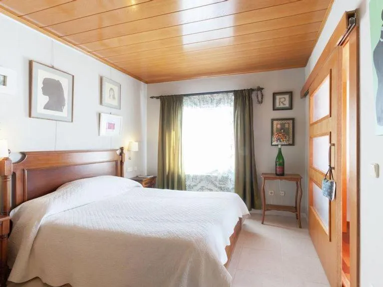 Bed in Cozy holiday home with pool in St Pere Pescador