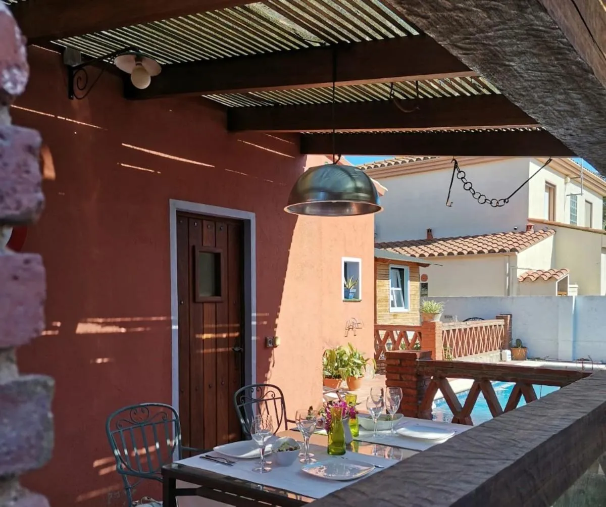 Patio in Cozy holiday home with pool in St Pere Pescador