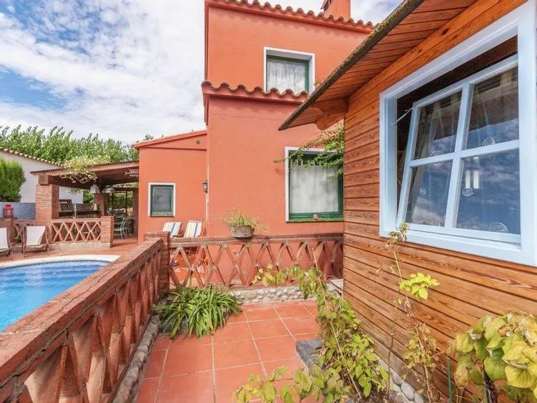 Swimming pool in Cozy holiday home with pool in St Pere Pescador