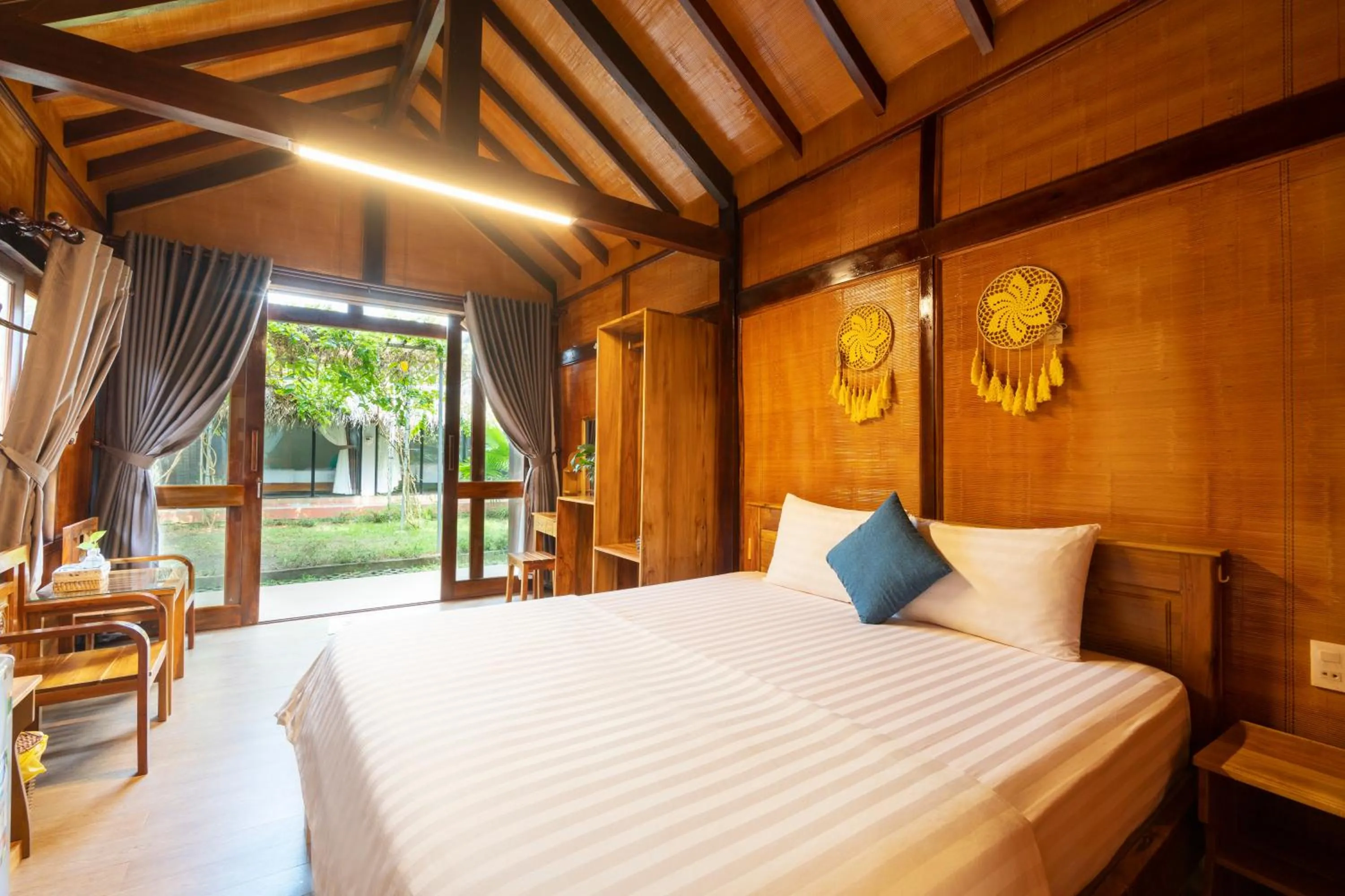 Bed in Khu Nghỉ Dưỡng Green Bungalow Phu Quoc