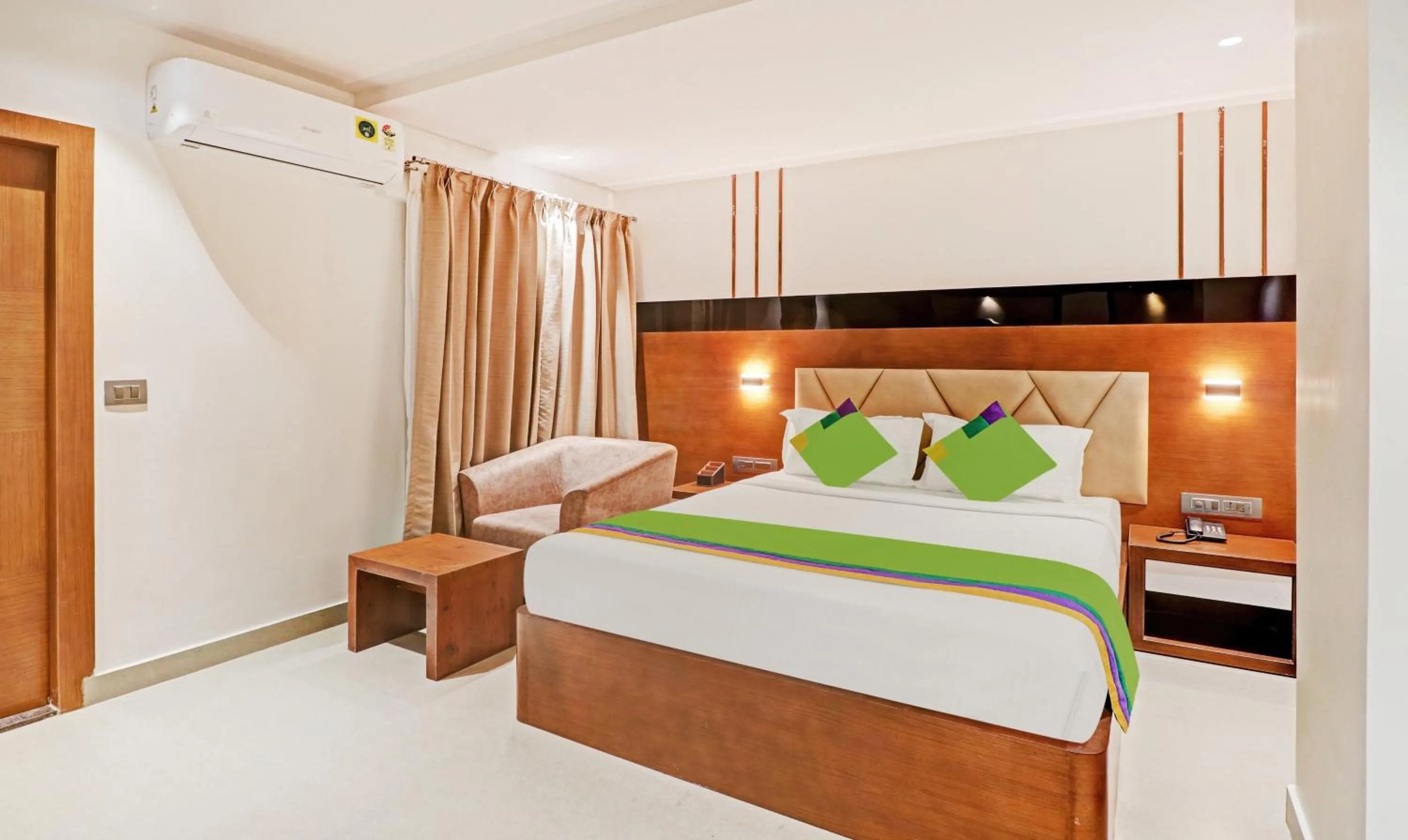 Bedroom, Bed in Treebo Emora Grand