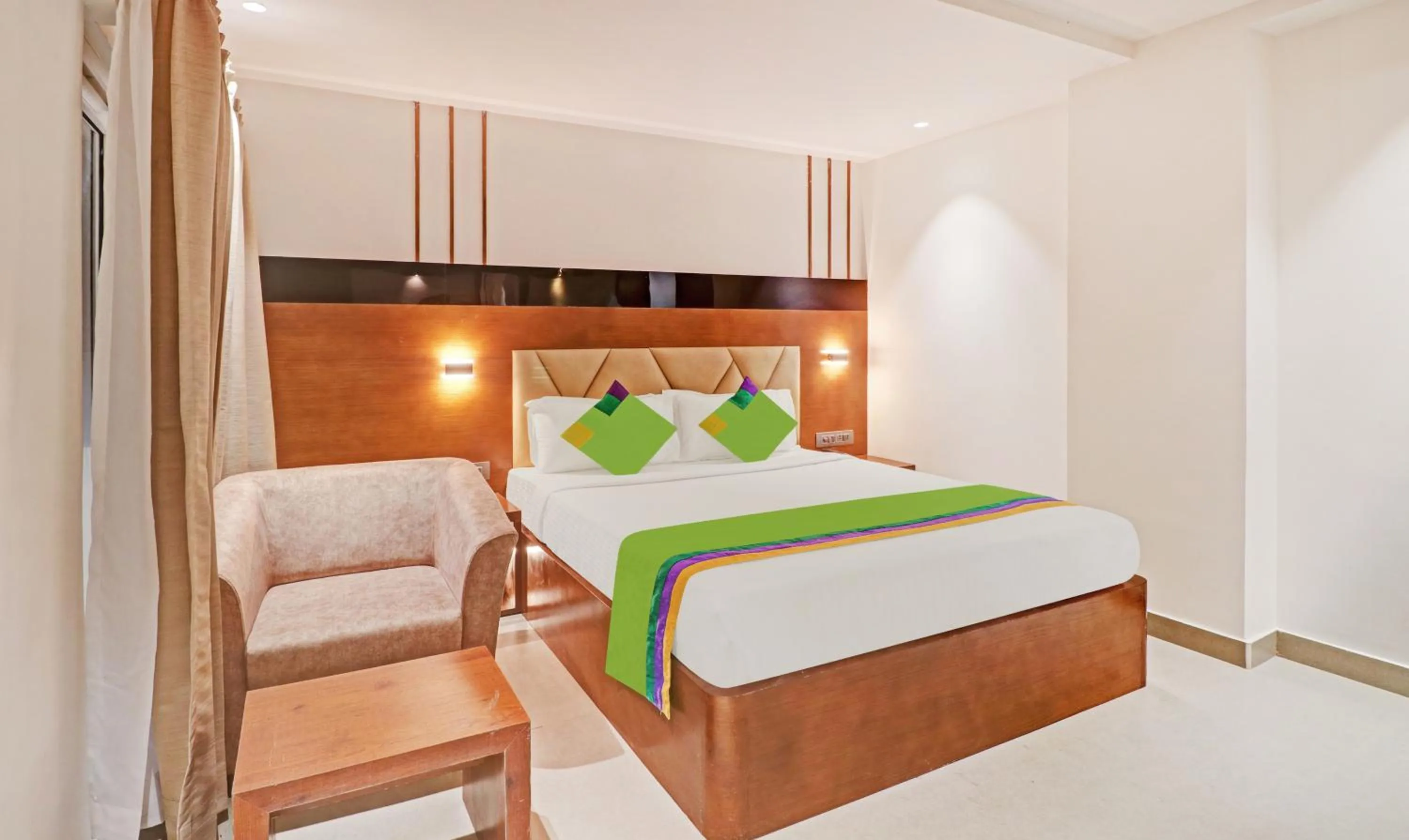 Bedroom, Bed in Treebo Emora Grand