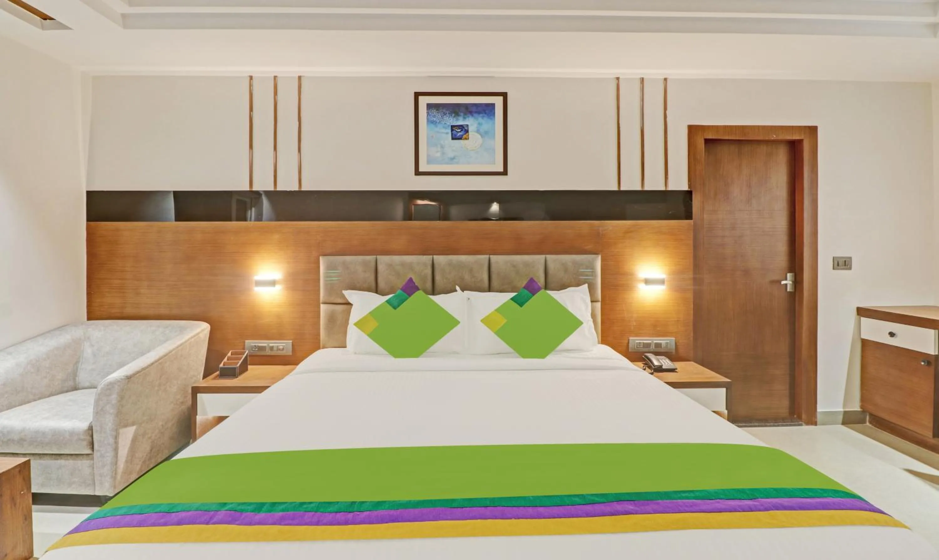 Photo of the whole room, Bed in Treebo Emora Grand