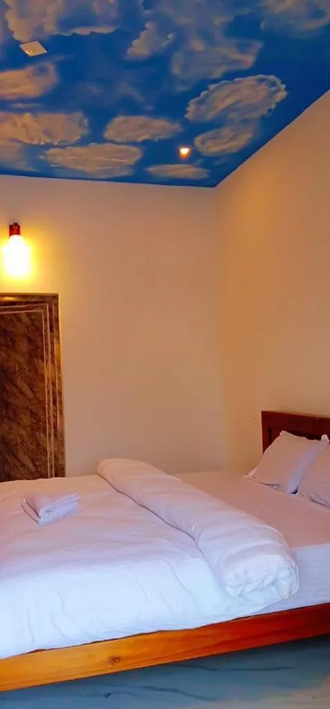 Bed in The Lavender Resort Waynad