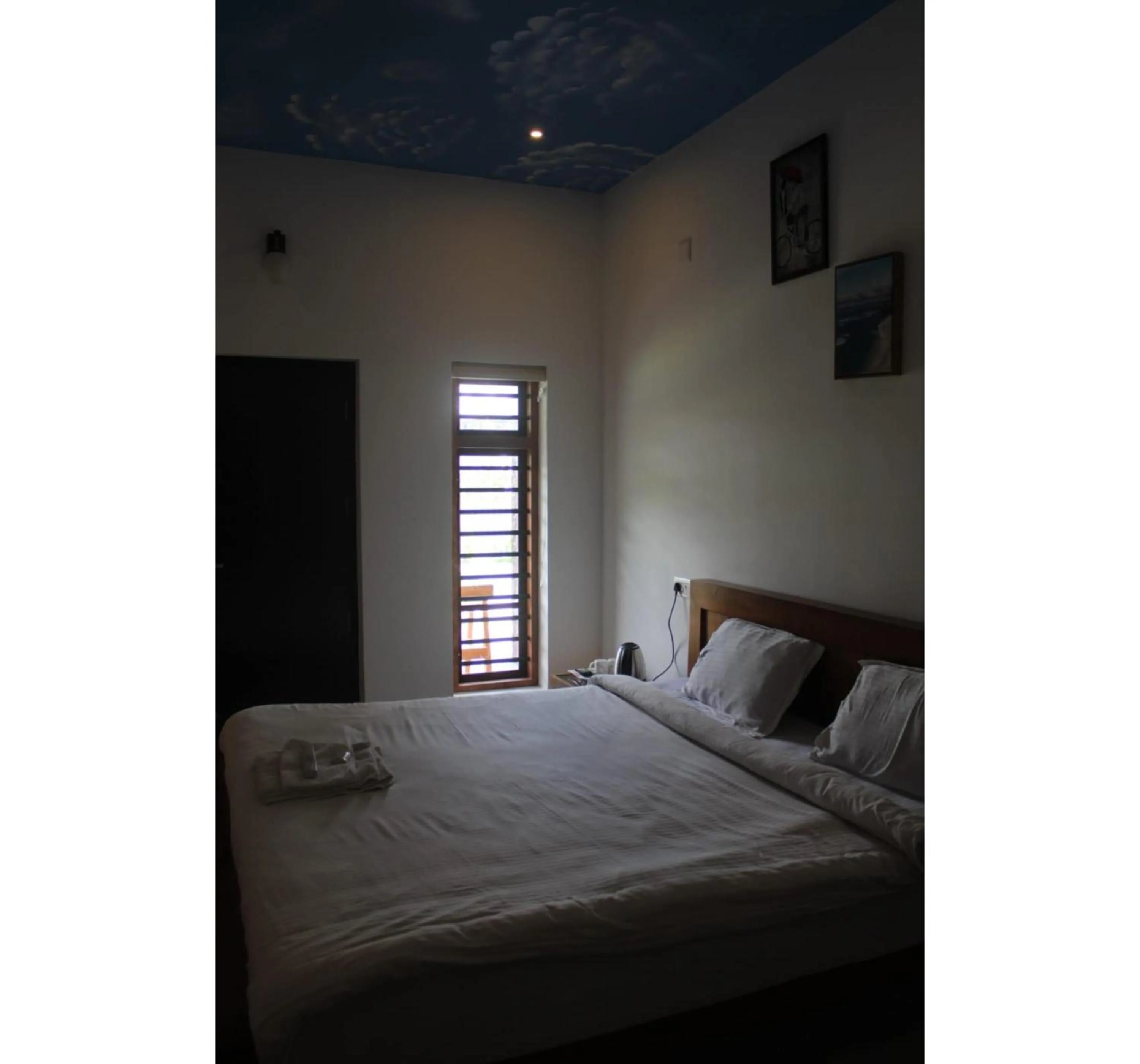 Bed in The Lavender Resort Waynad
