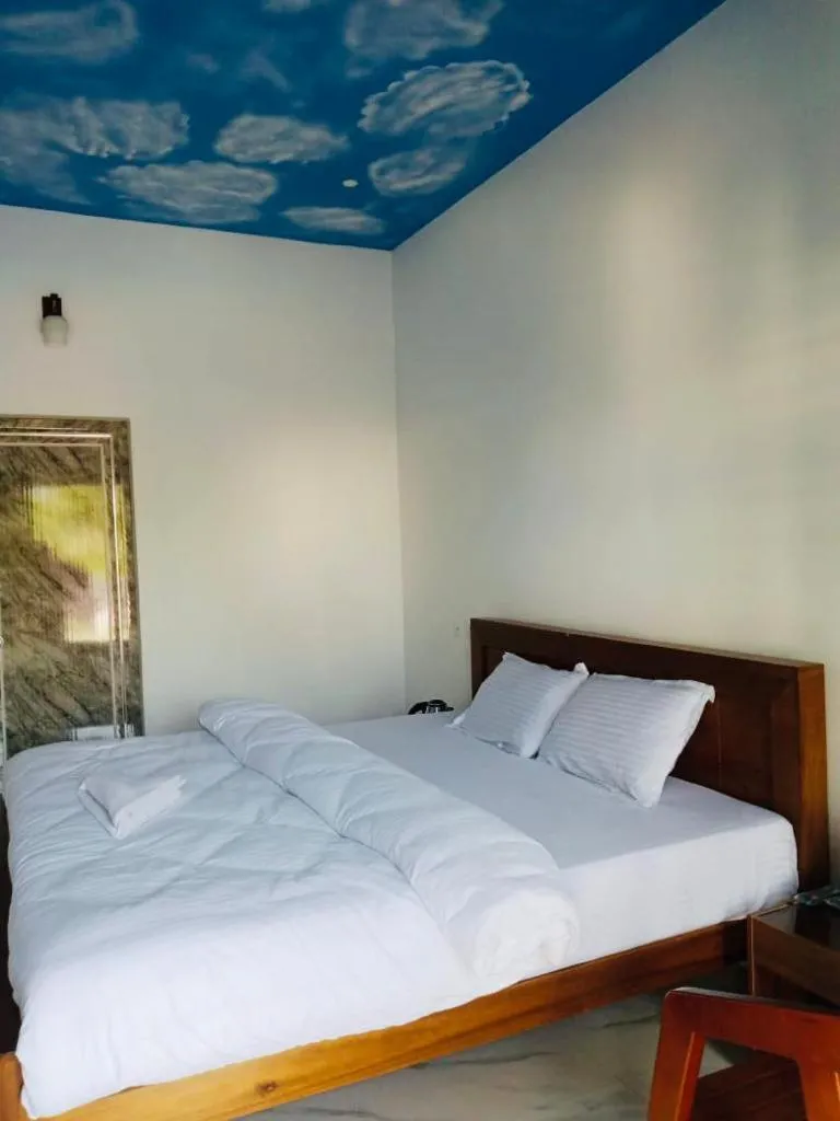 Bed in The Lavender Resort Waynad