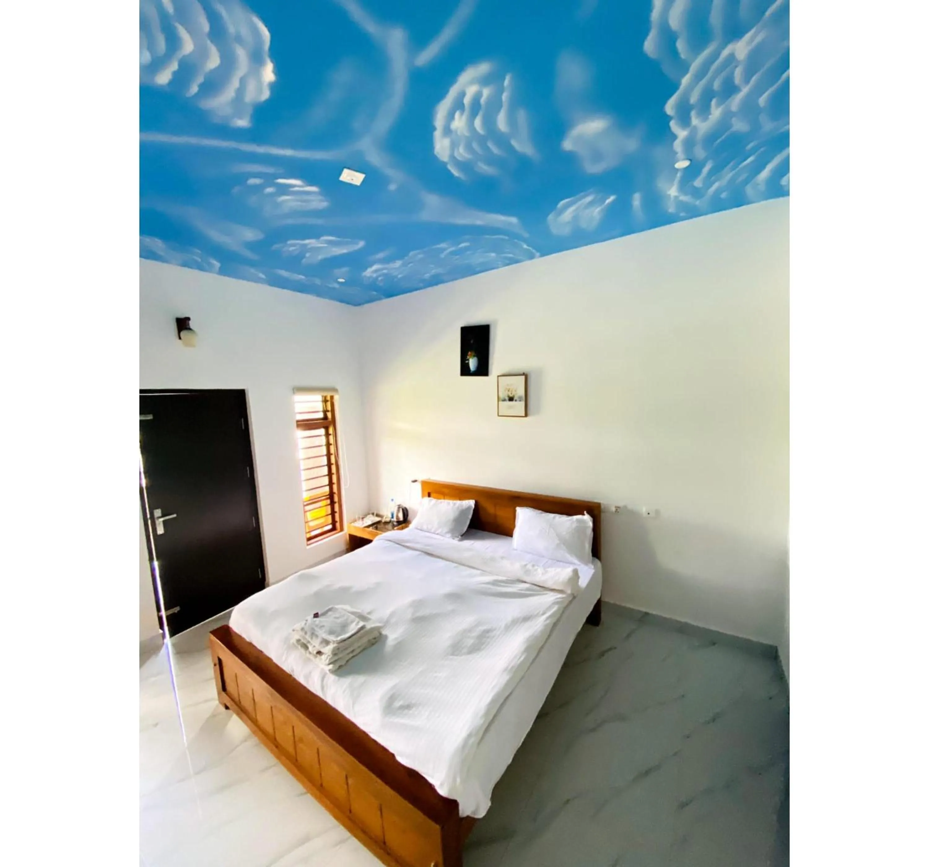 Bed in The Lavender Resort Waynad