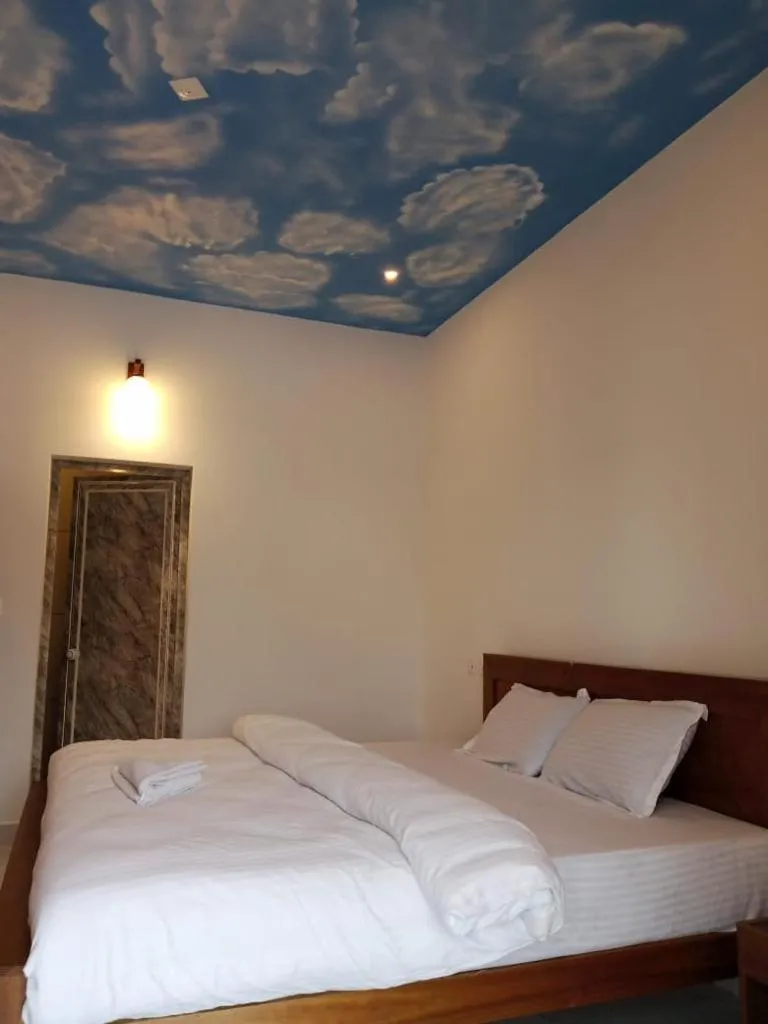Bed in The Lavender Resort Waynad