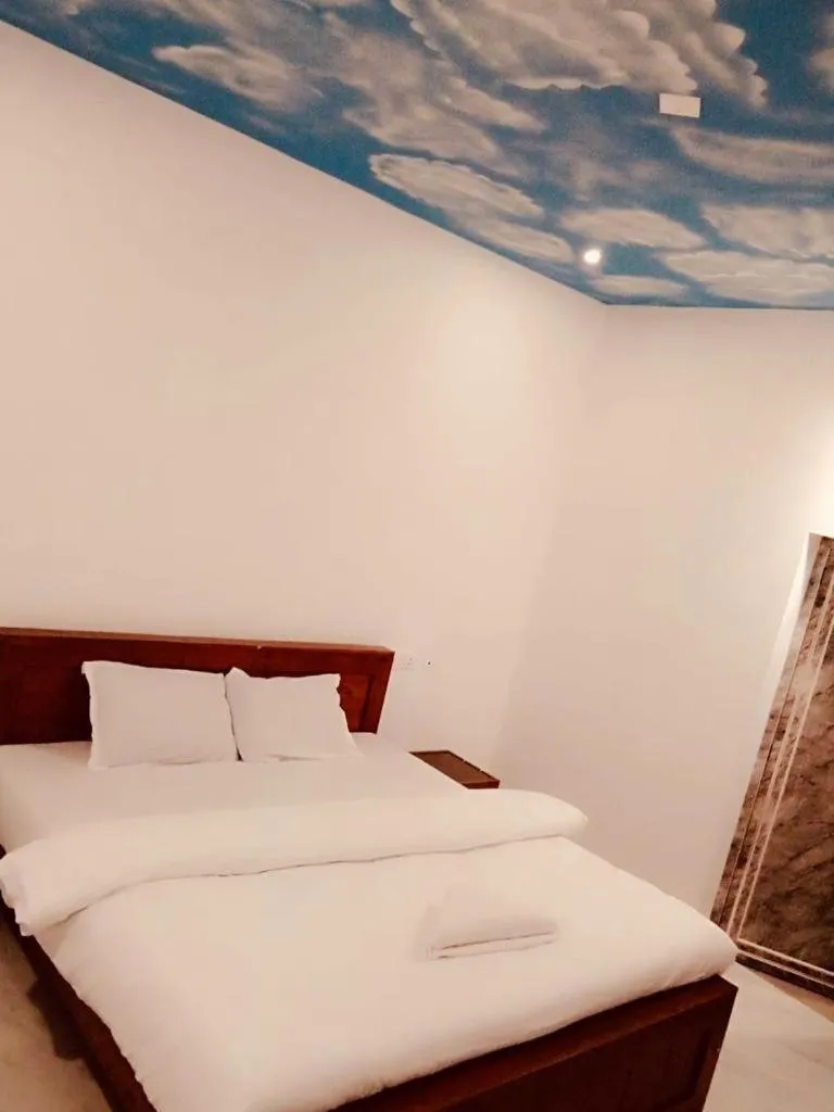 Bed in The Lavender Resort Waynad