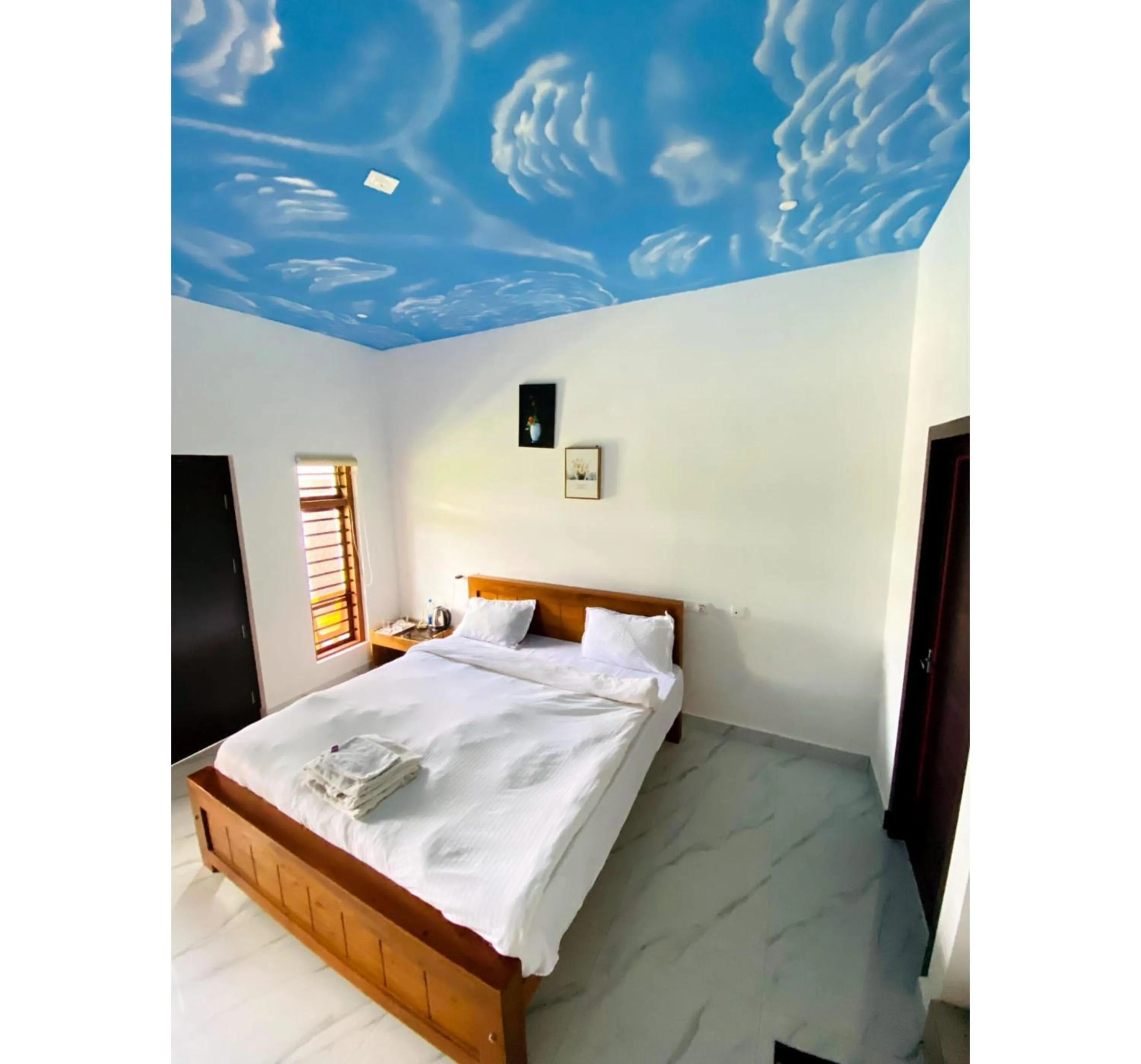 Bed in The Lavender Resort Waynad