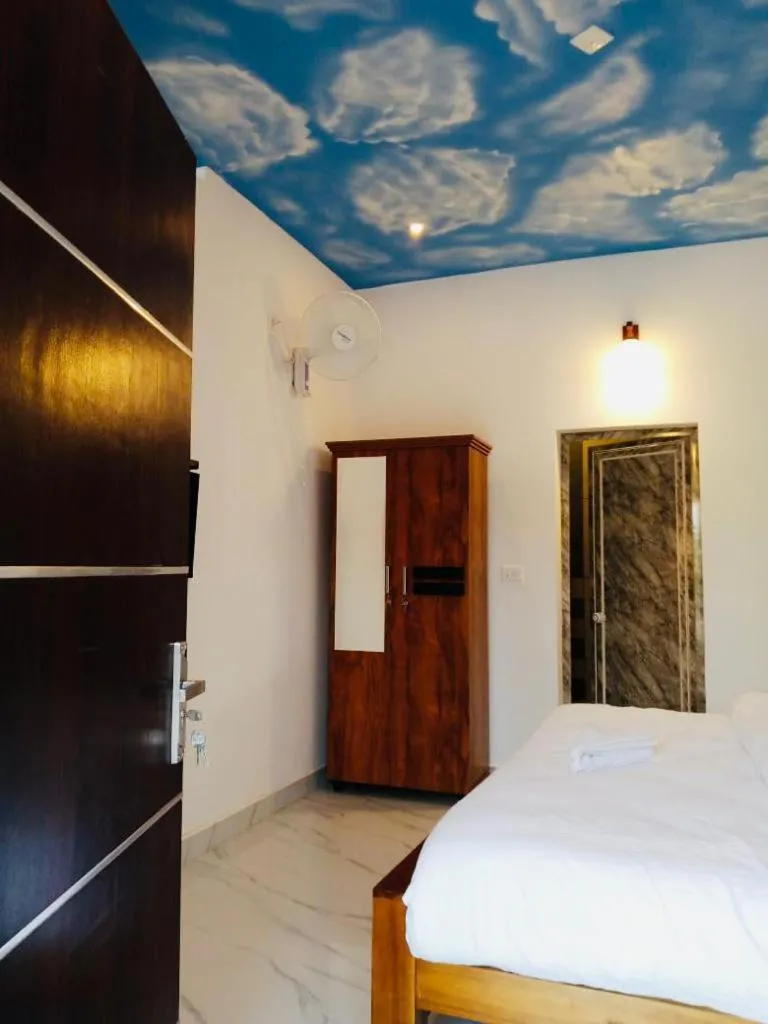 Bed in The Lavender Resort Waynad