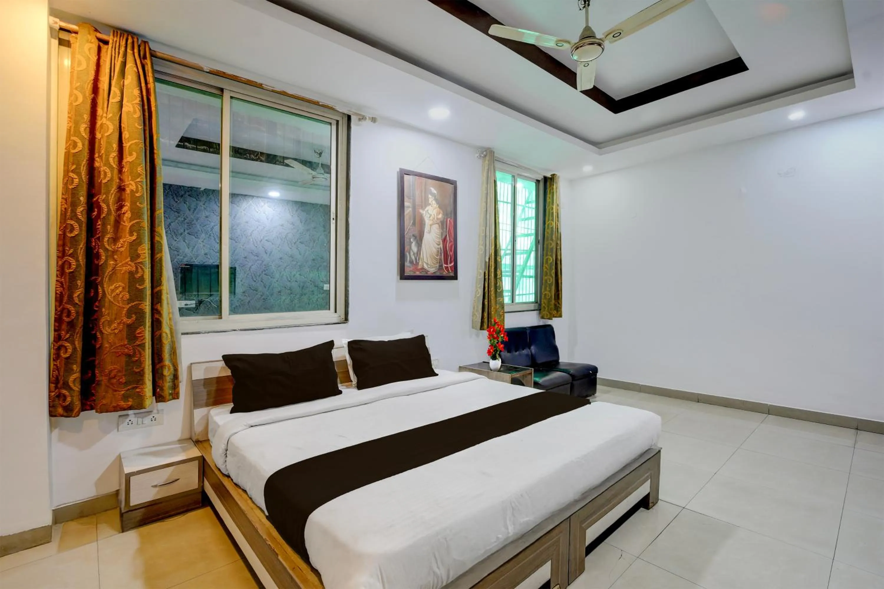 Photo of the whole room, Bed in Super Collection O Shahpura Lakeview Formerly Hotel Royal Villa