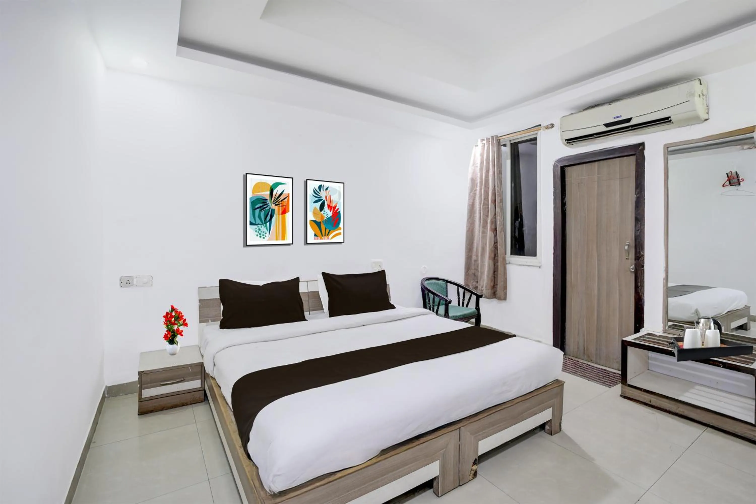 Photo of the whole room, Bed in Super Collection O Shahpura Lakeview Formerly Hotel Royal Villa