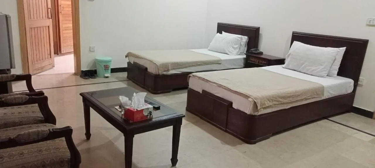Photo of the whole room, Bed in Luxury Palace Peshawar