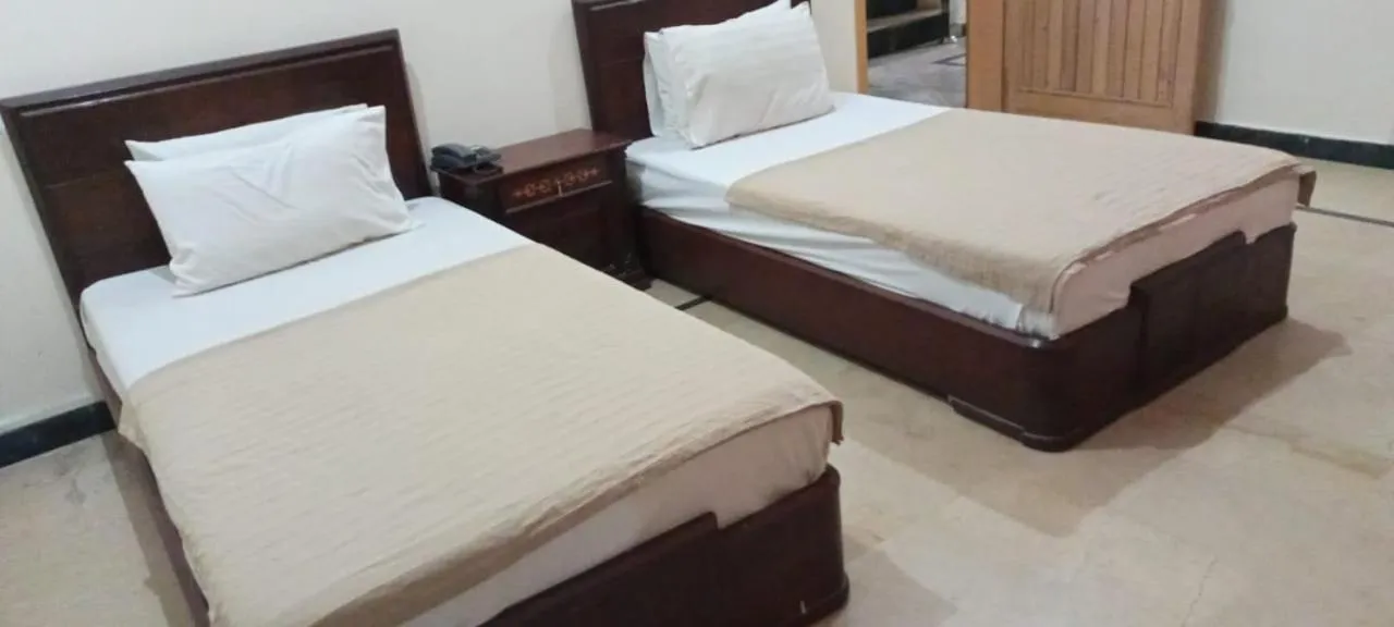 Photo of the whole room, Bed in Luxury Palace Peshawar