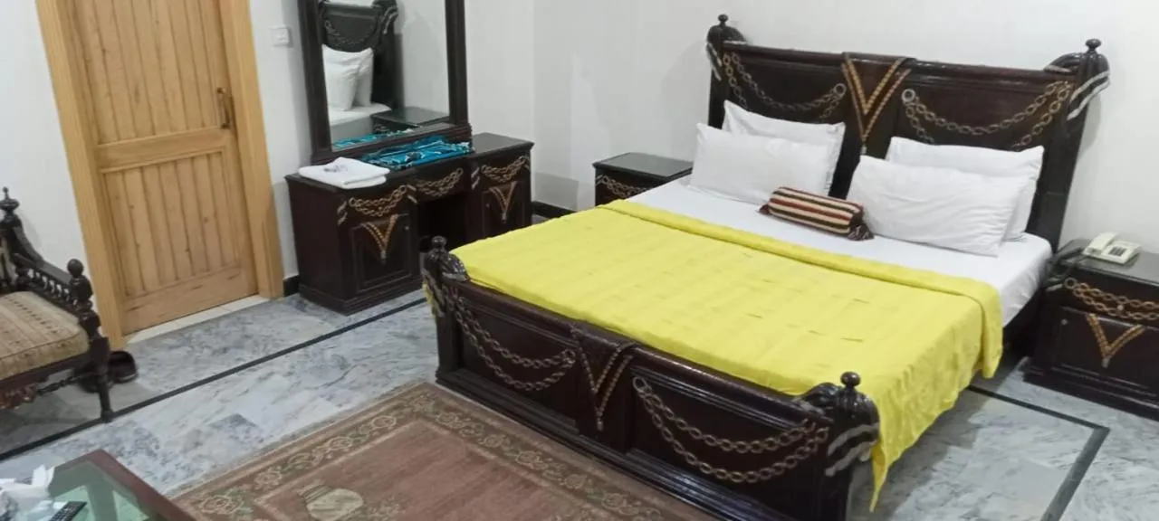 Photo of the whole room, Bed in Luxury Palace Peshawar