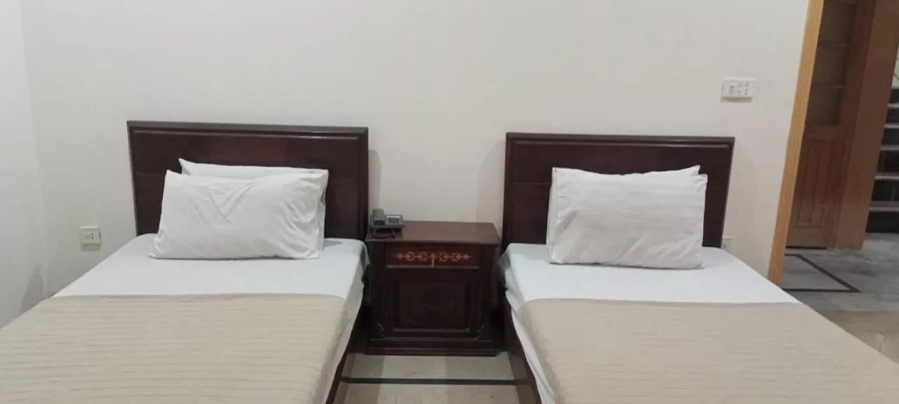 Photo of the whole room, Bed in Luxury Palace Peshawar