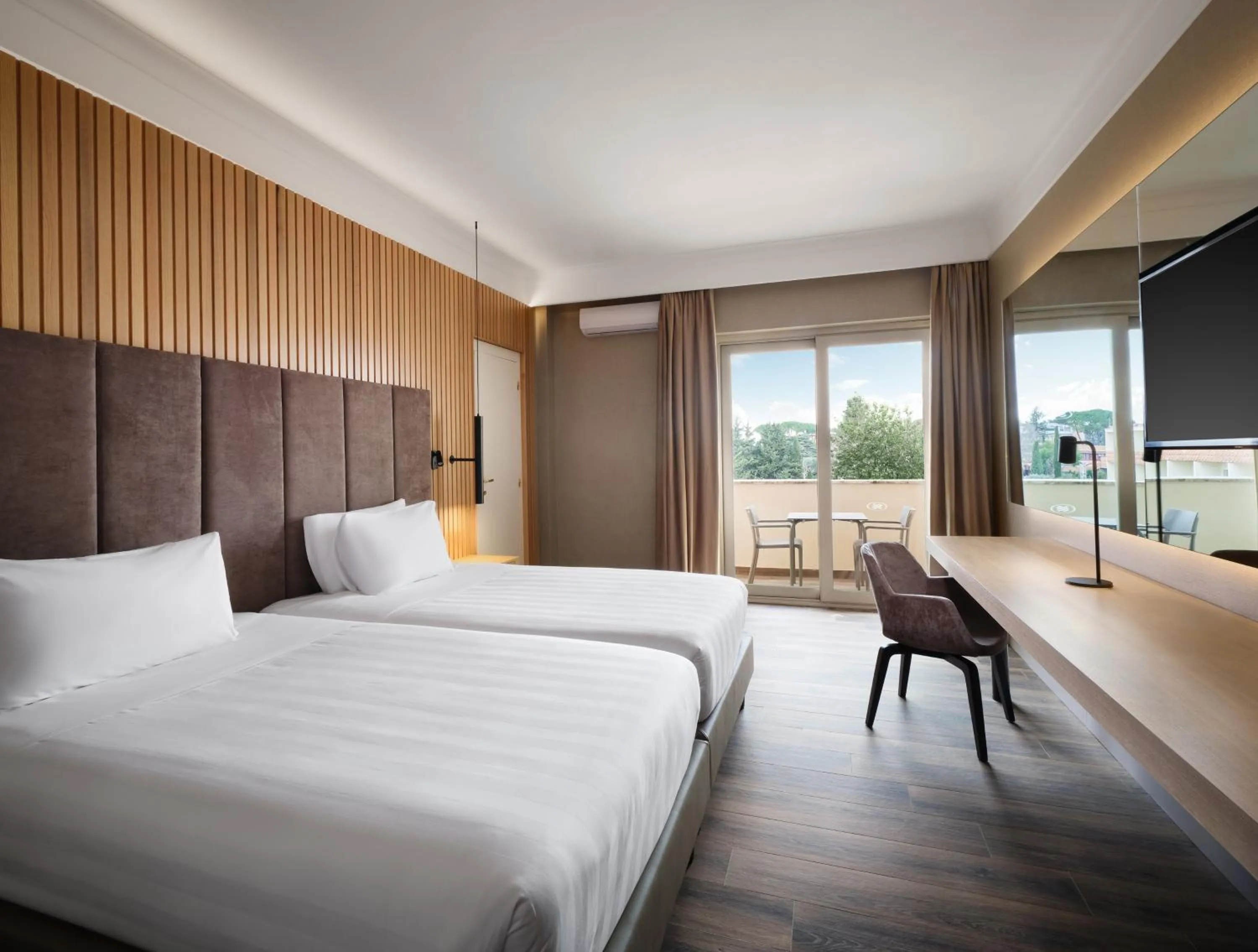 Photo of the whole room, Bed in Crowne Plaza Rome St. Peter's by IHG