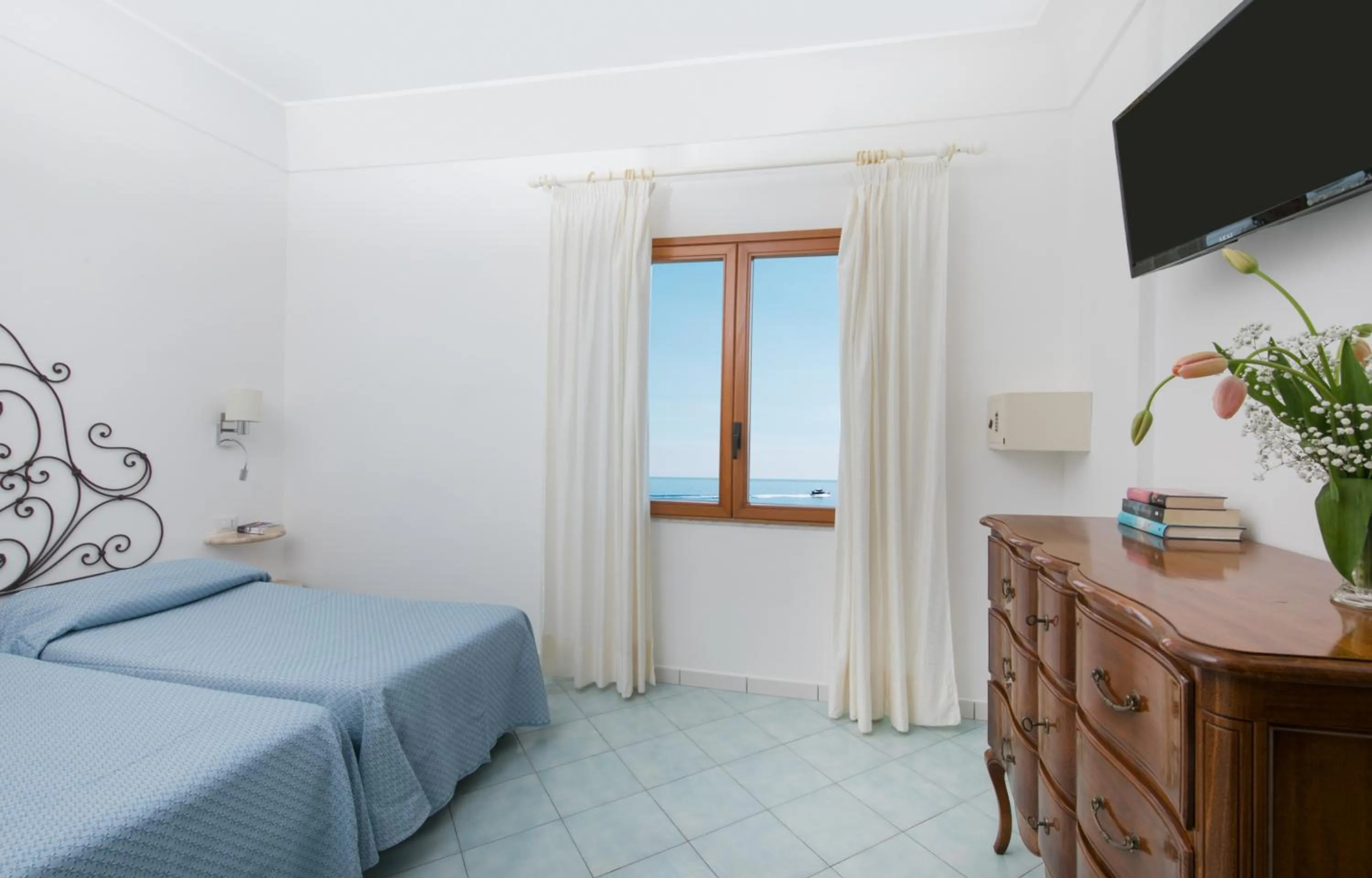 Bed in Hotel Pupetto