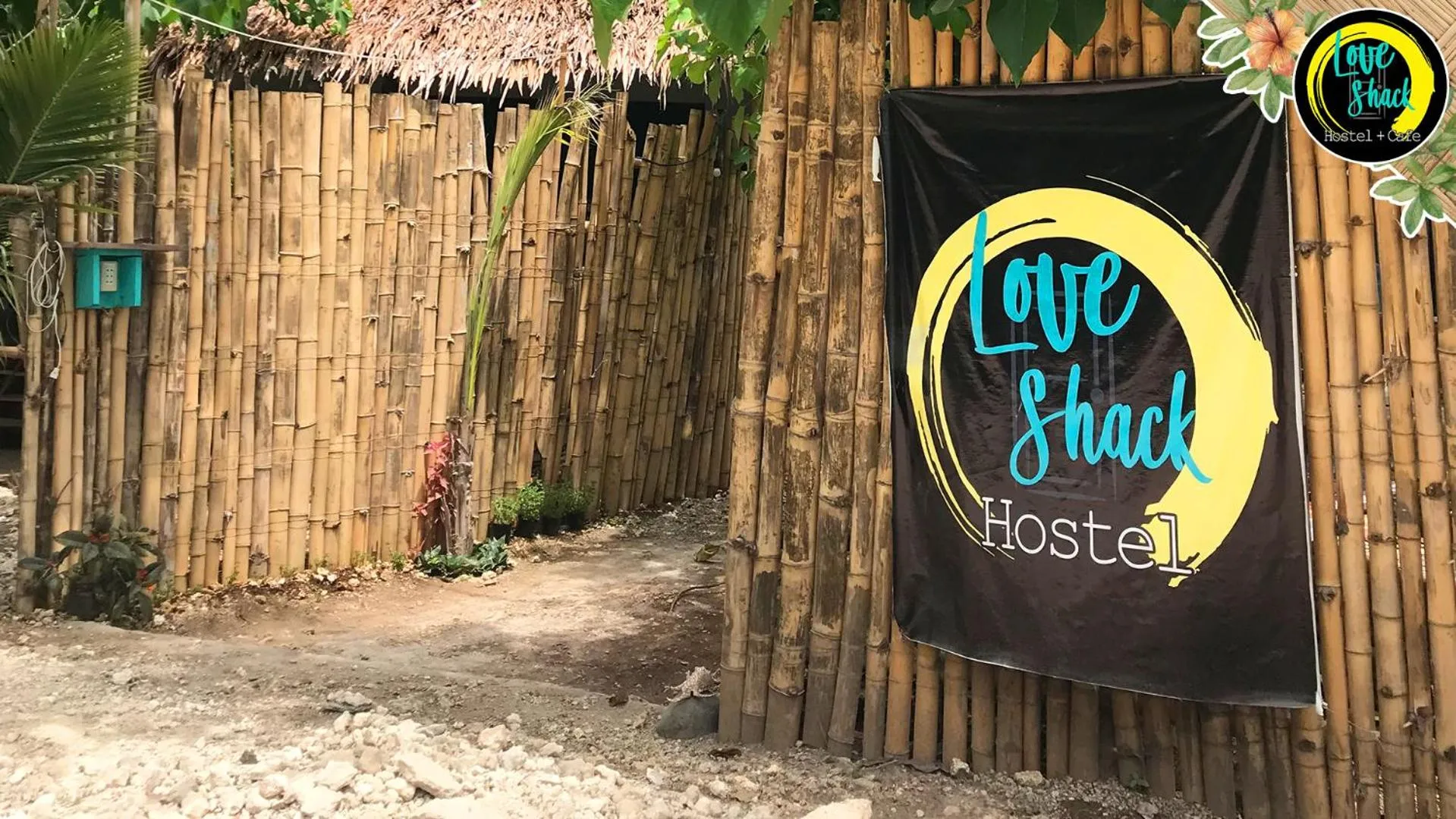 Property logo or sign in Love Shack Hostel & Cafe