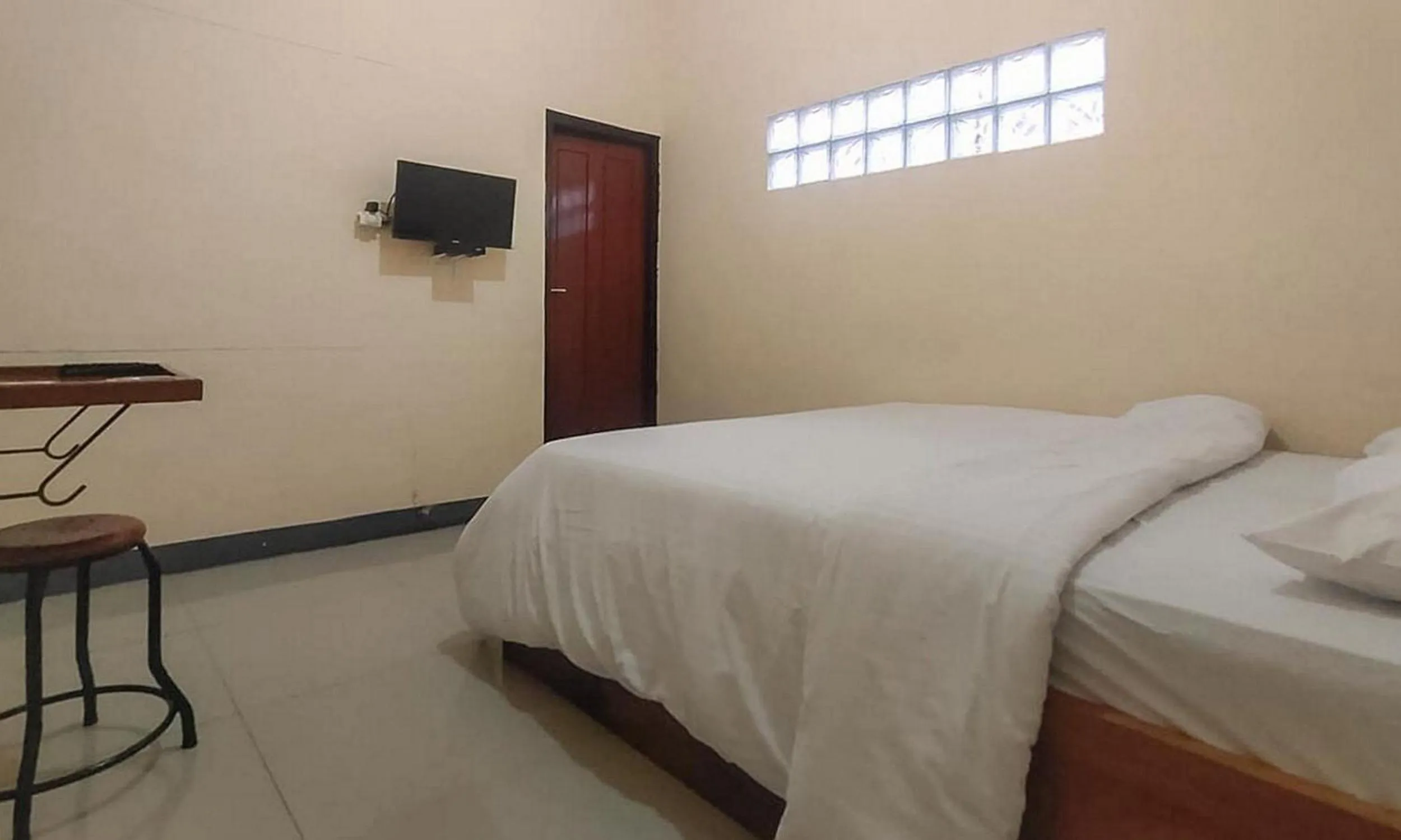 Bed in RedDoorz @ Merauke City Center