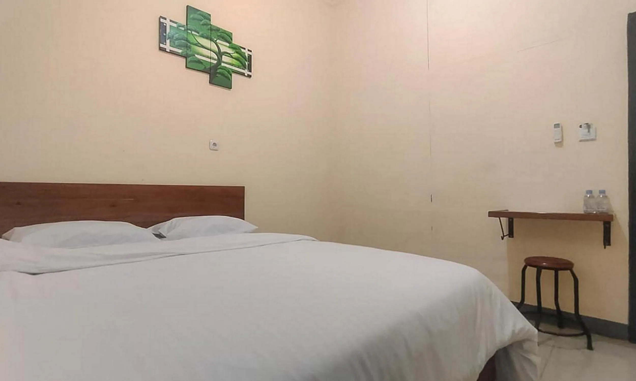 Bed in RedDoorz @ Merauke City Center