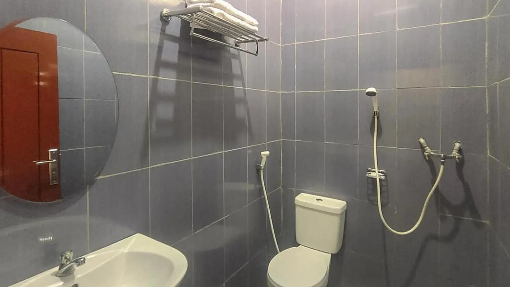 Twin Room in RedDoorz @ Merauke City Center Twin Room in RedDoorz @ Merauke City Center