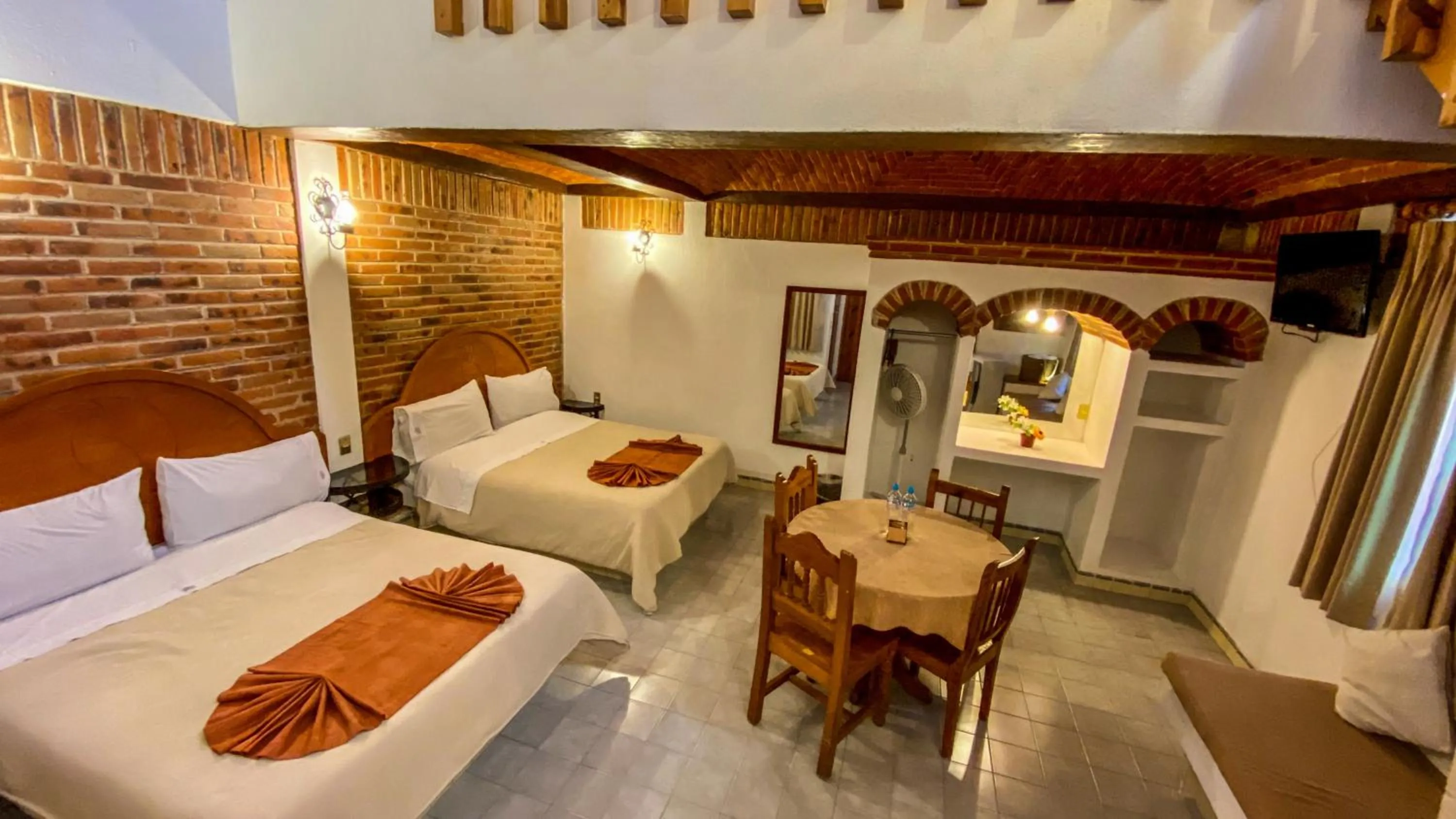 Bed in Suites Paraiso Tequis