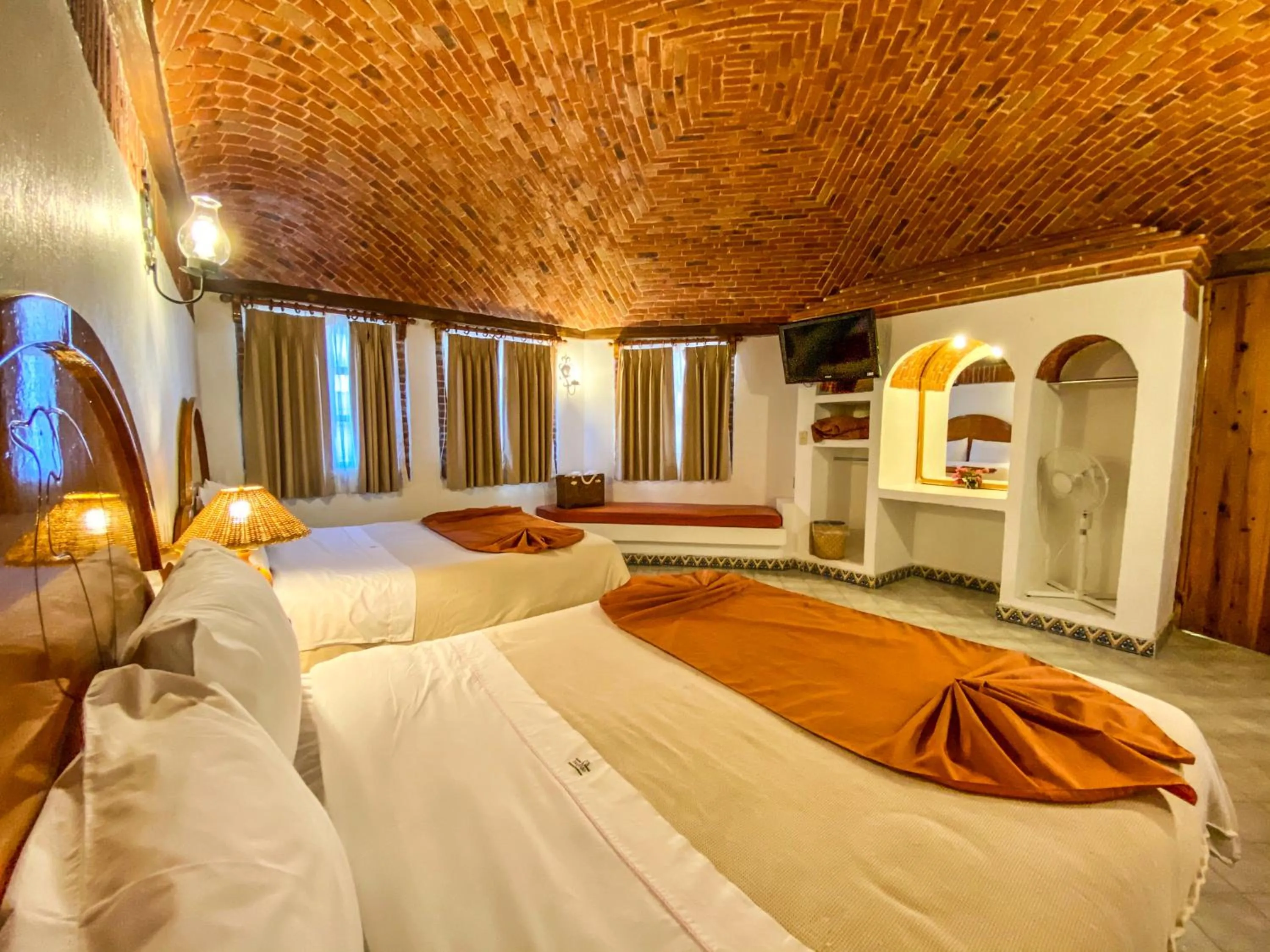 Bed in Suites Paraiso Tequis