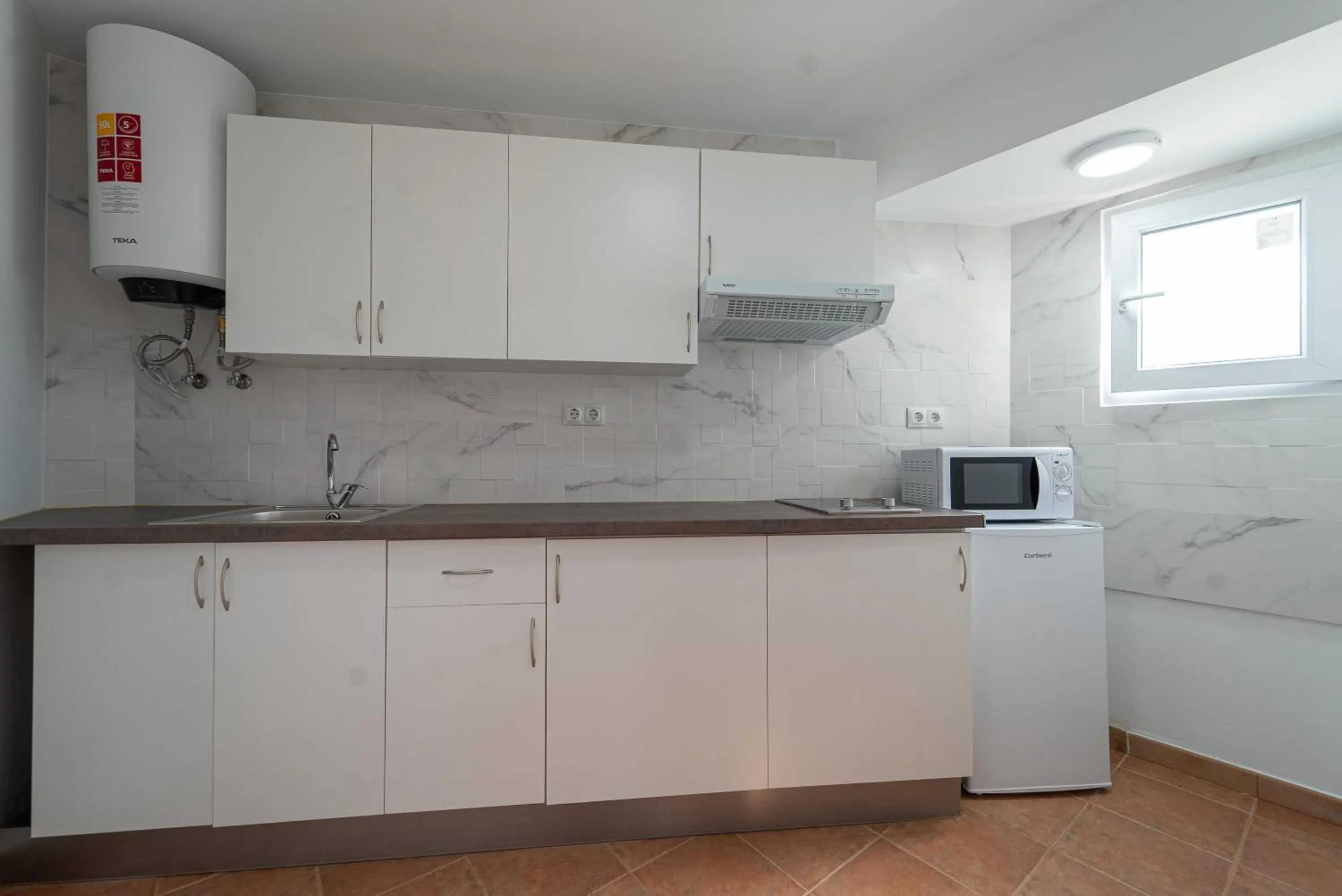 Kitchen or kitchenette in CASADELMAR Marbella 23 APARTAMENTOS VACACIONALES