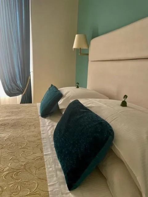 Bed in Albergo Belsoggiorno