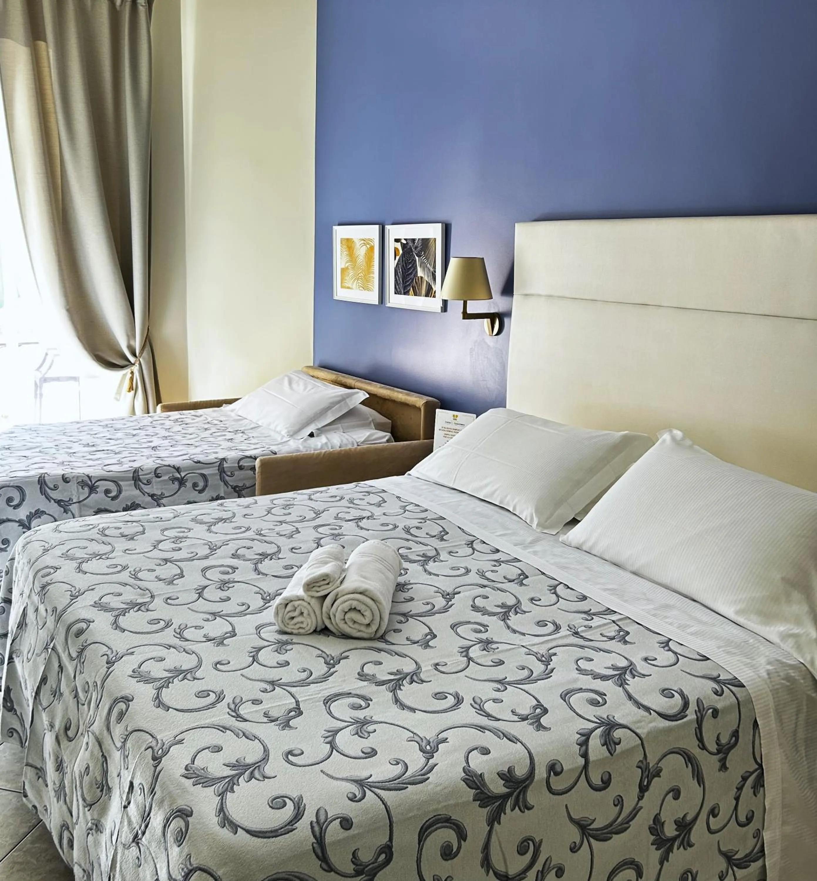 Bed in Albergo Belsoggiorno