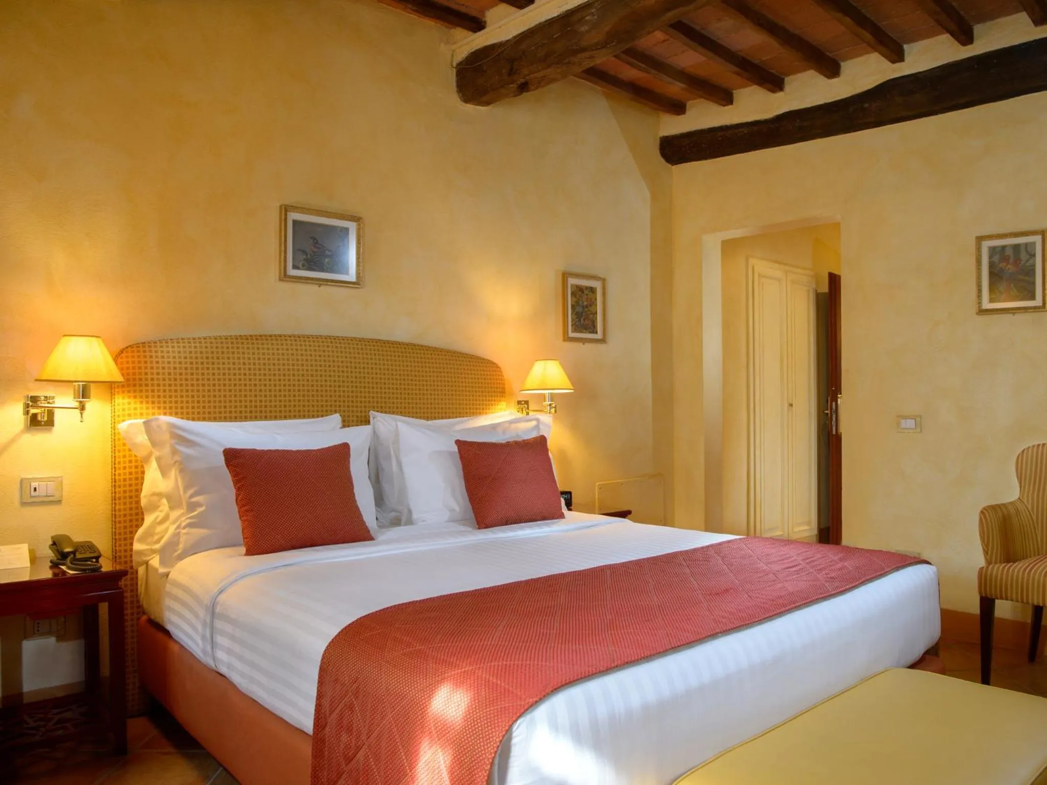Bedroom in La Bagnaia Golf Resort