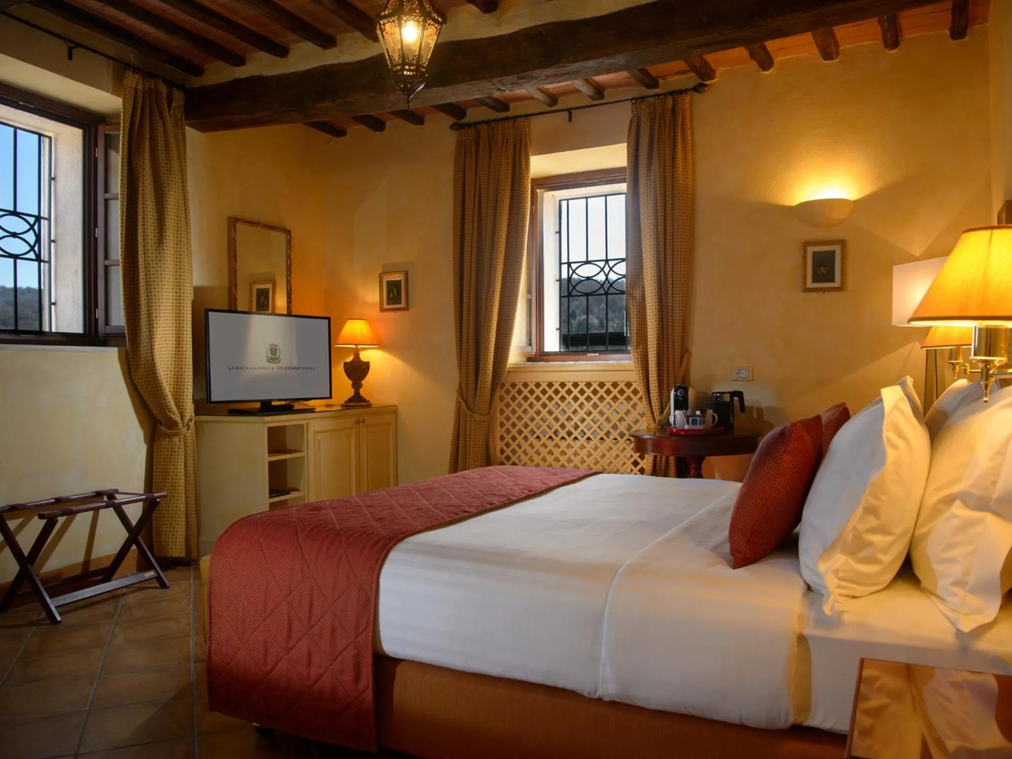 Bedroom in La Bagnaia Golf Resort