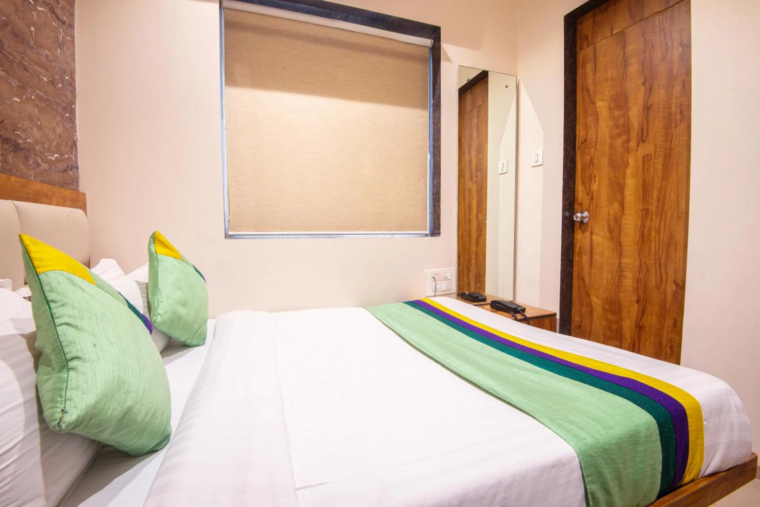 Bedroom, Bed in Treebo Amber Imperial