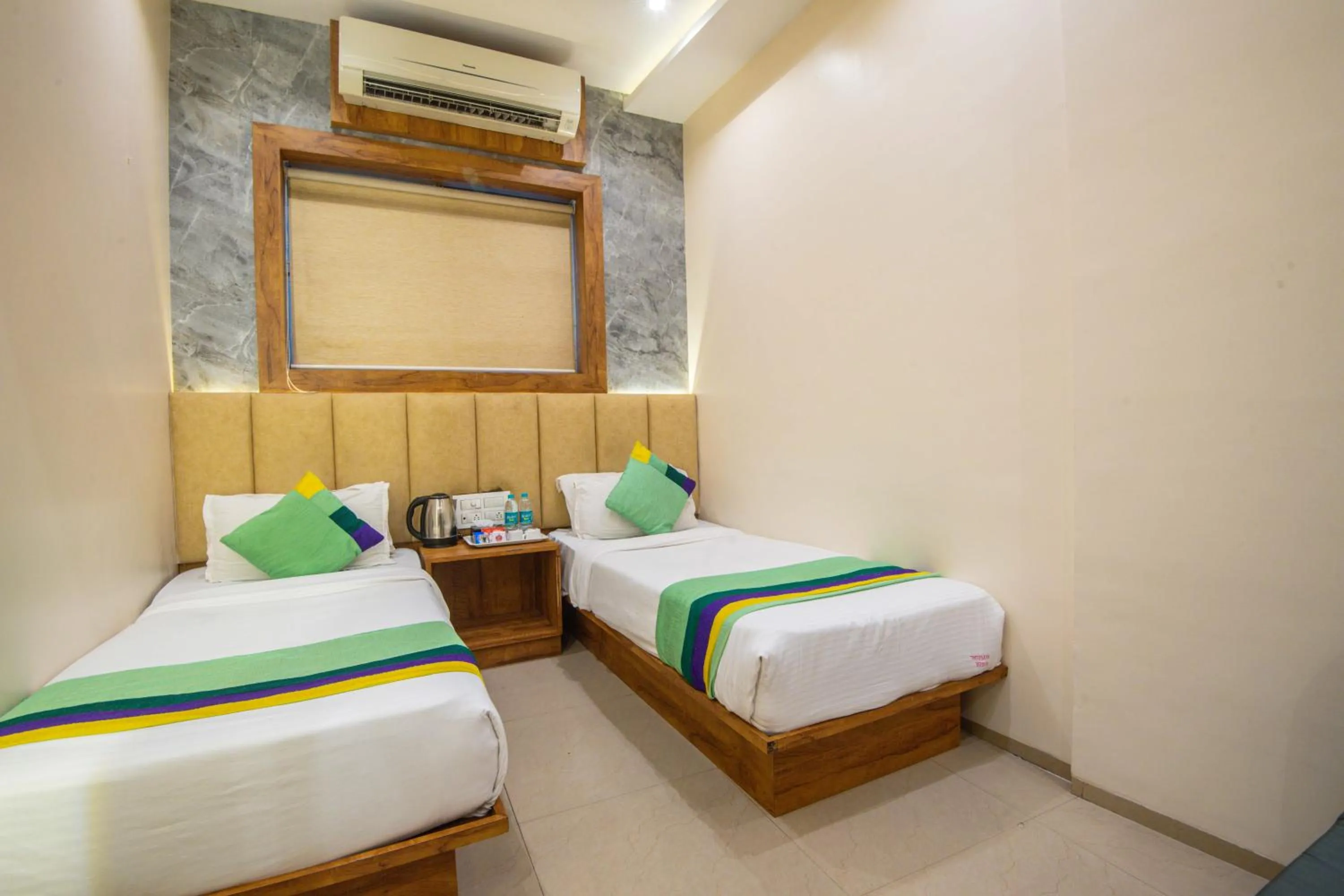 Bedroom, Bed in Treebo Amber Imperial