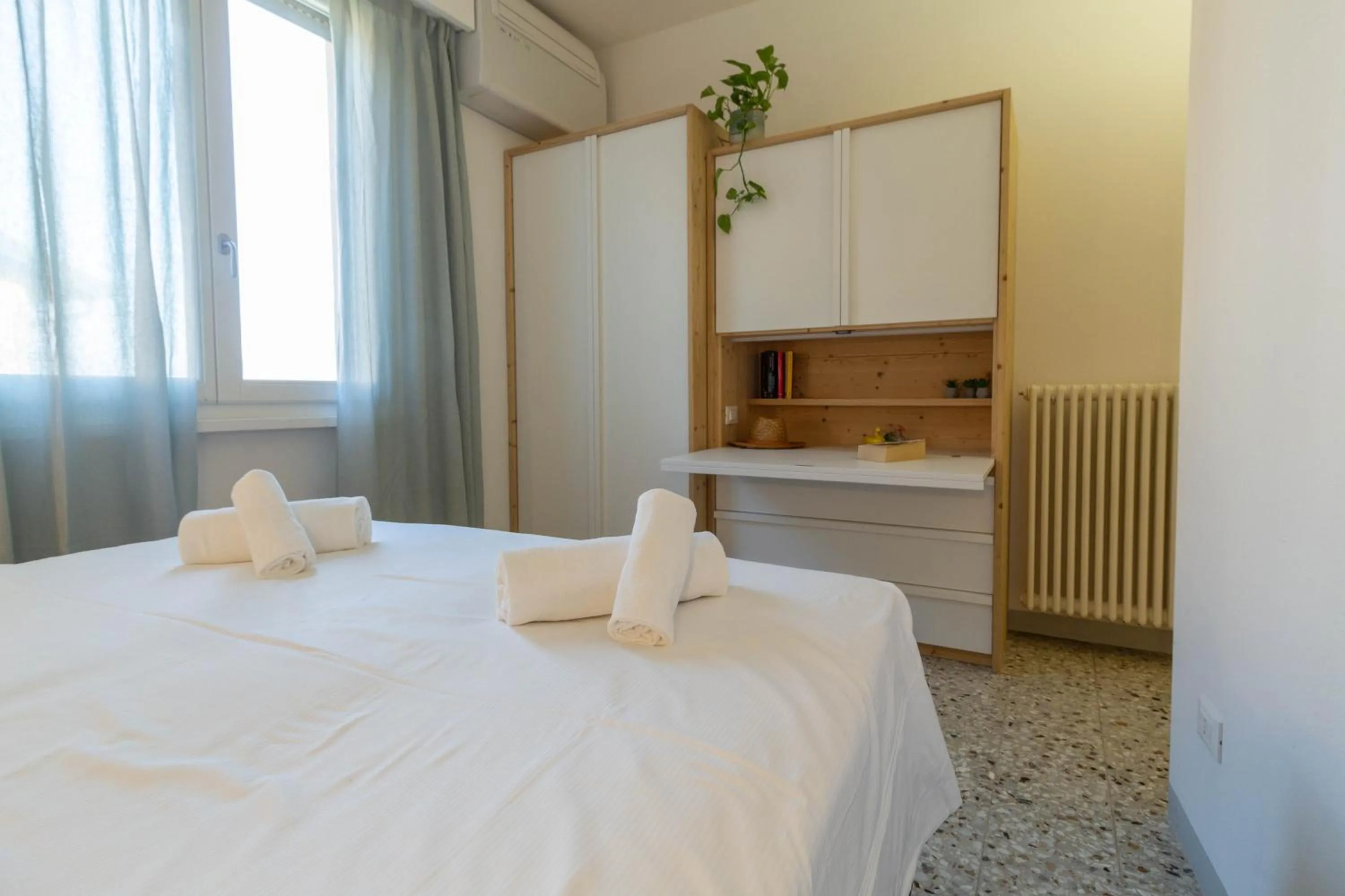 Bedroom, Bed in Mamma Ciccia Holiday Home - Waterfront Apartment