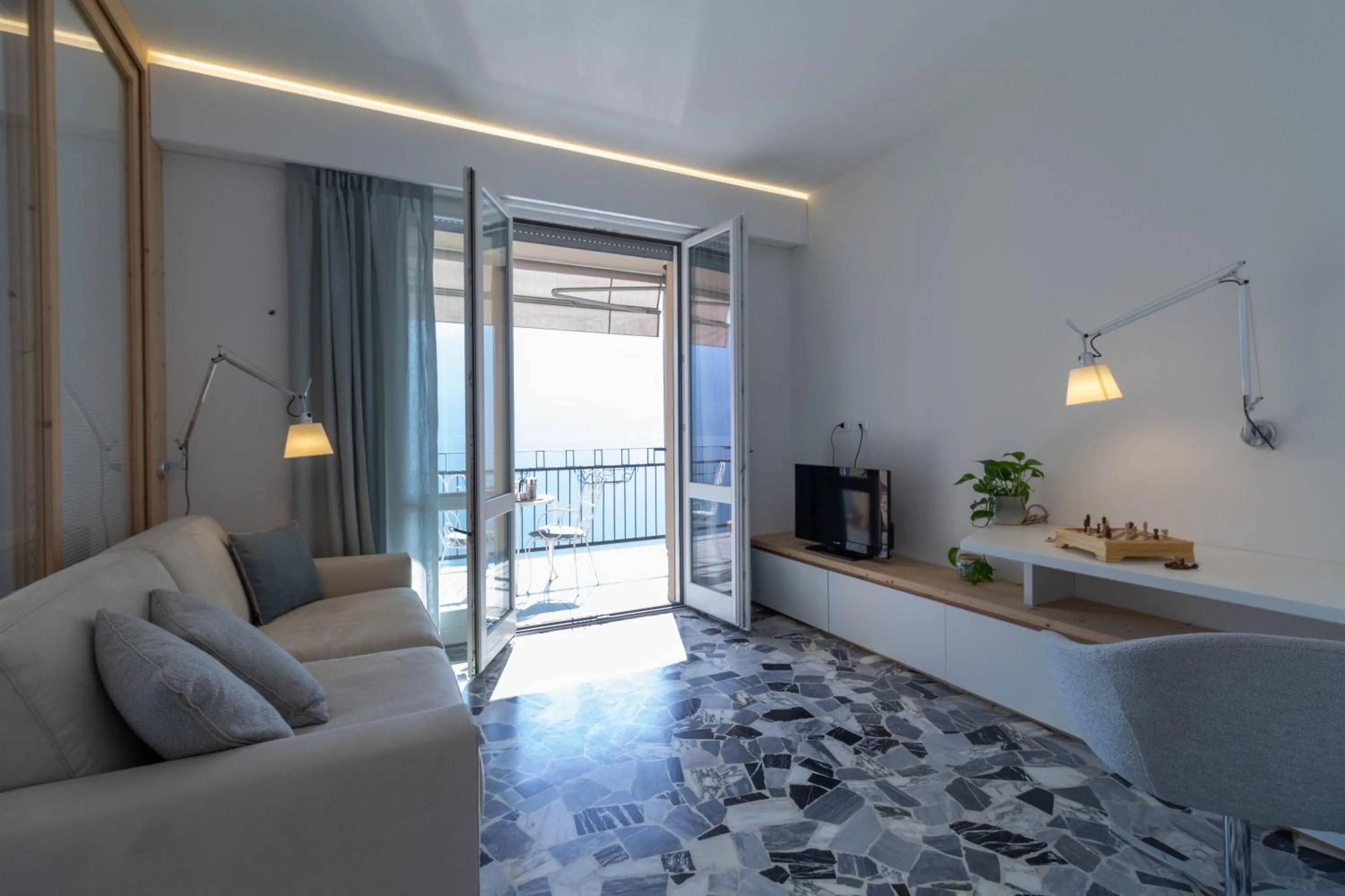 Living room in Mamma Ciccia Holiday Home - Waterfront Apartment