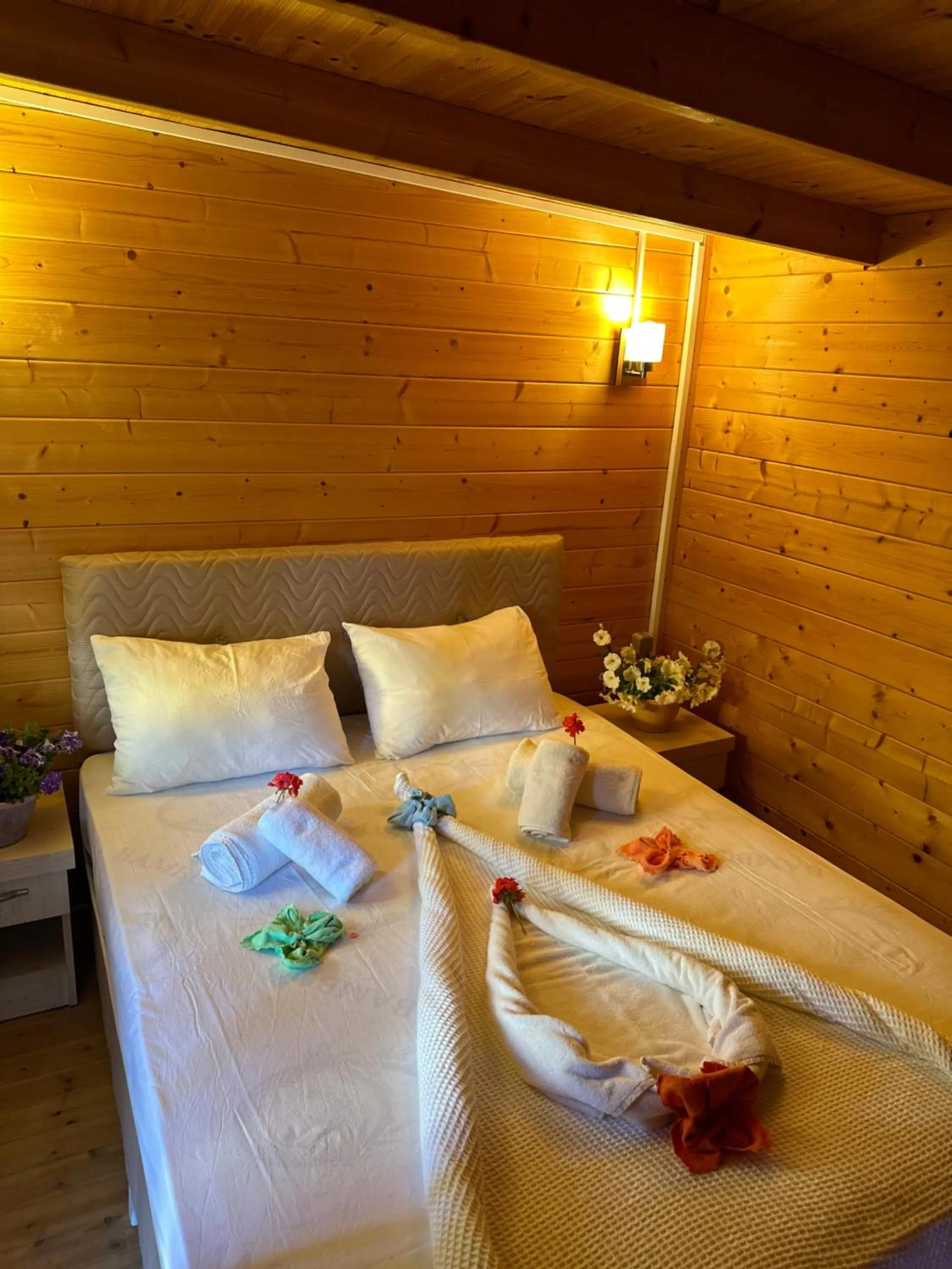 Bed in Felicity Hotel & Bungalows