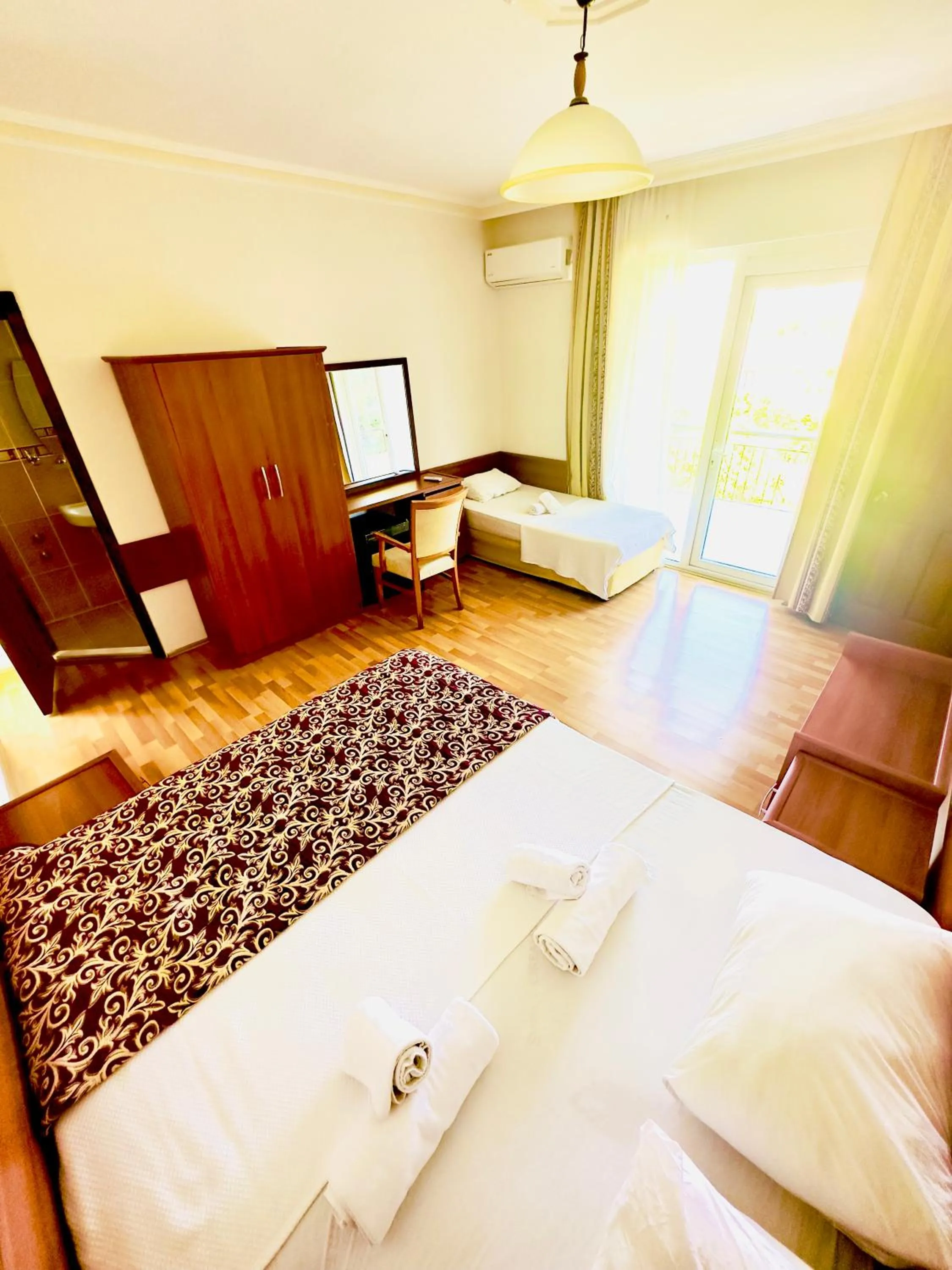 Bedroom in Felicity Hotel & Bungalows