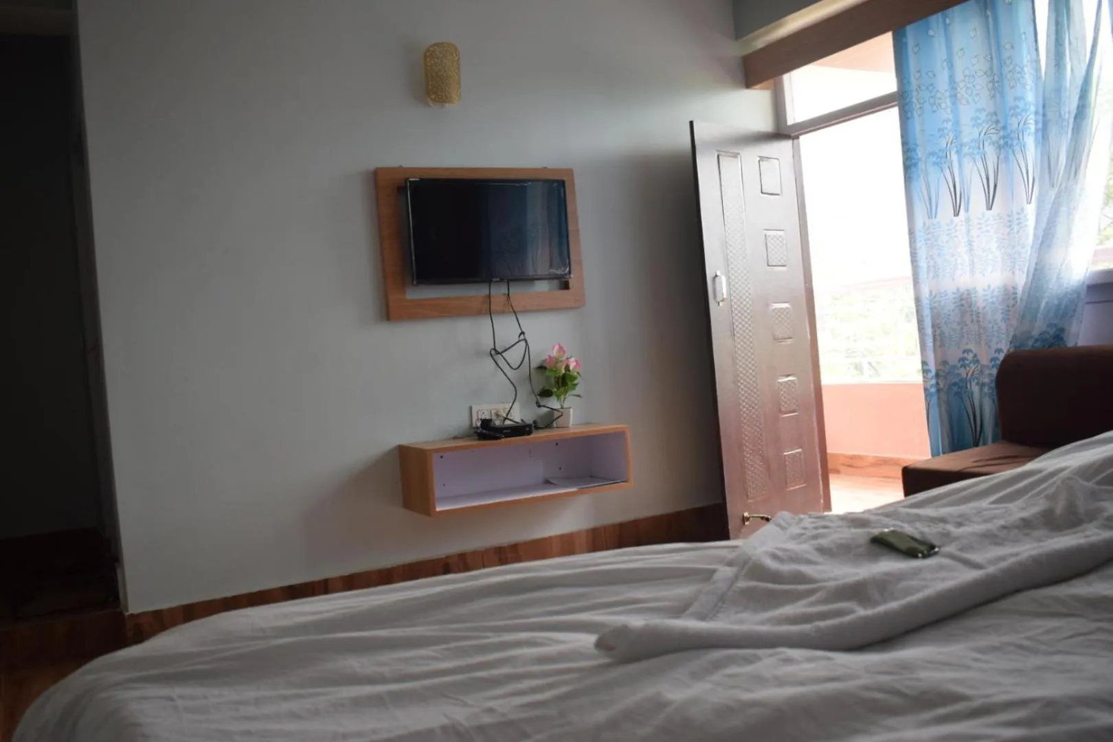 TV and multimedia, Bed in Mandavya homestay