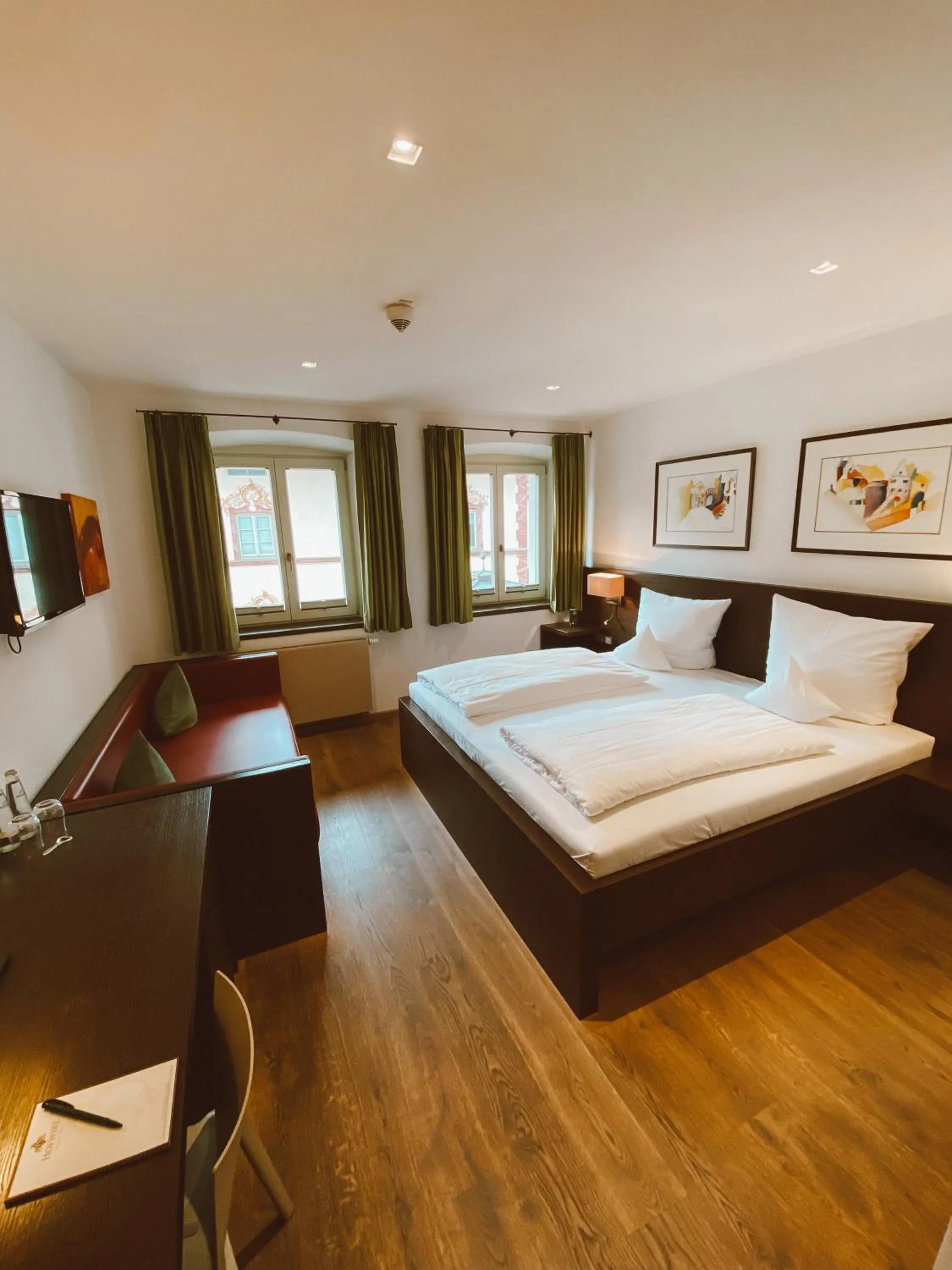 Photo of the whole room, Bed in Hotel Hofwirt Neubeuern