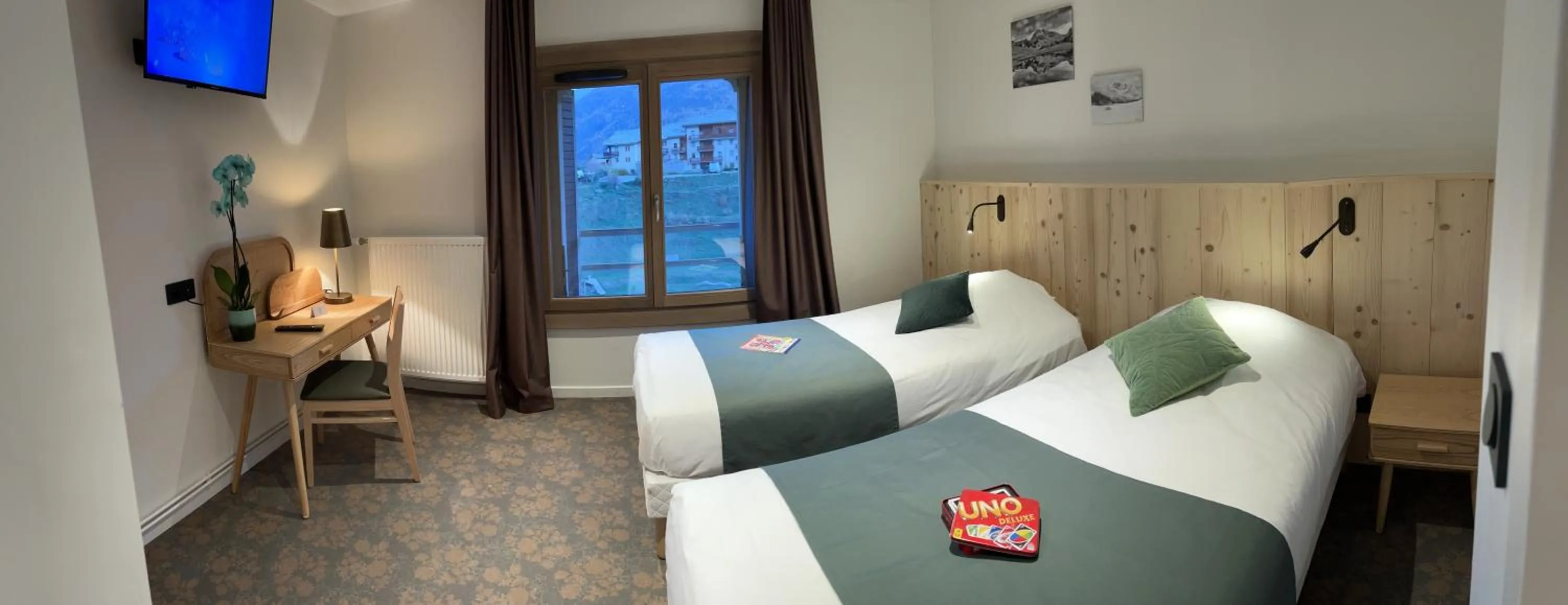 Bed in Village de vacances Fleurs et Neige