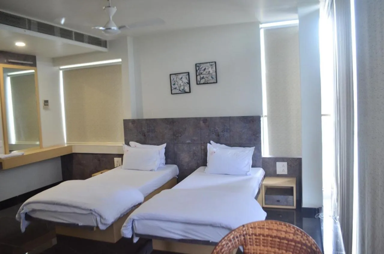 Bed in Hotel O2 Sangli