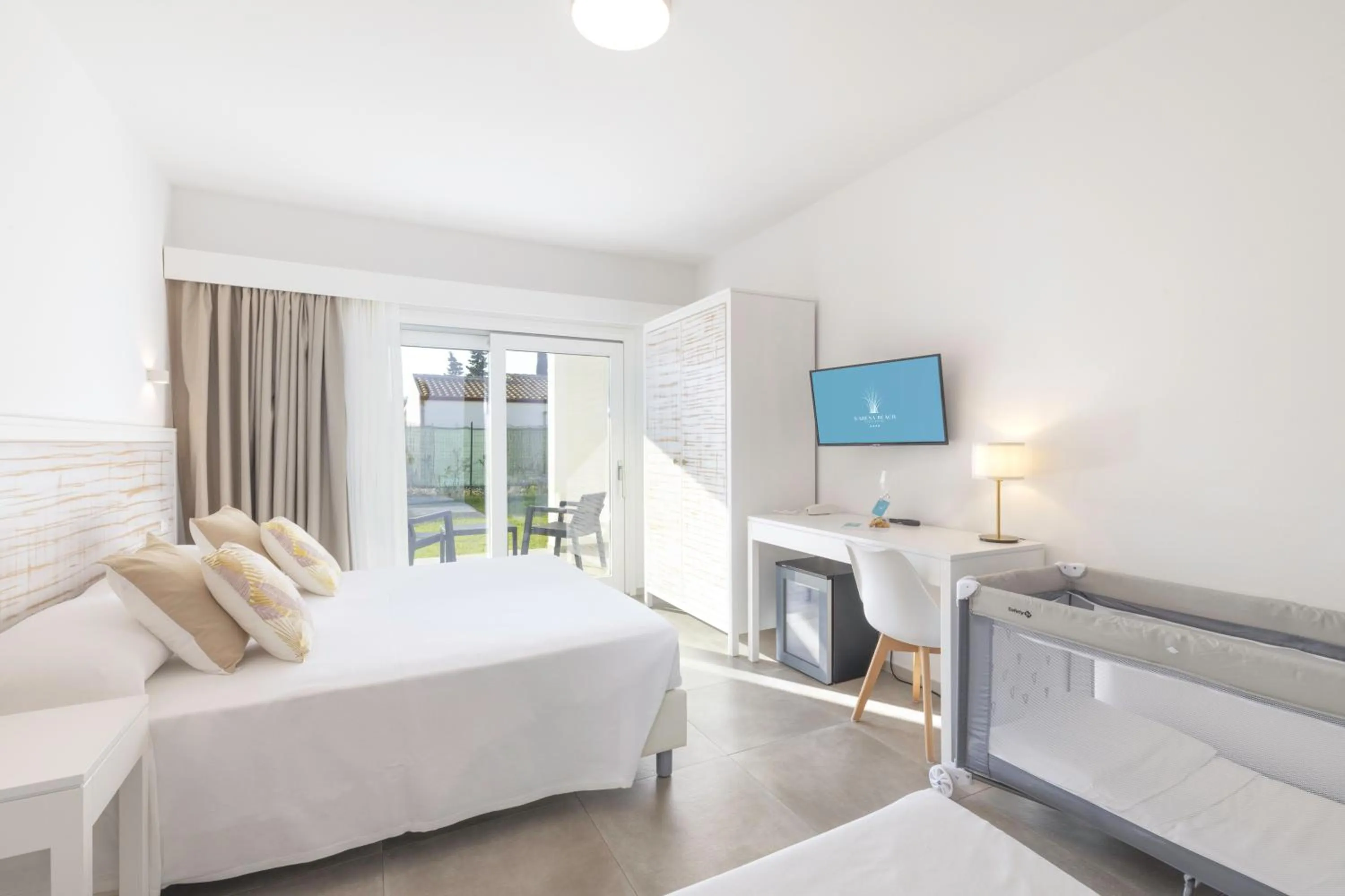 Bed in Hotel S'arena Beach