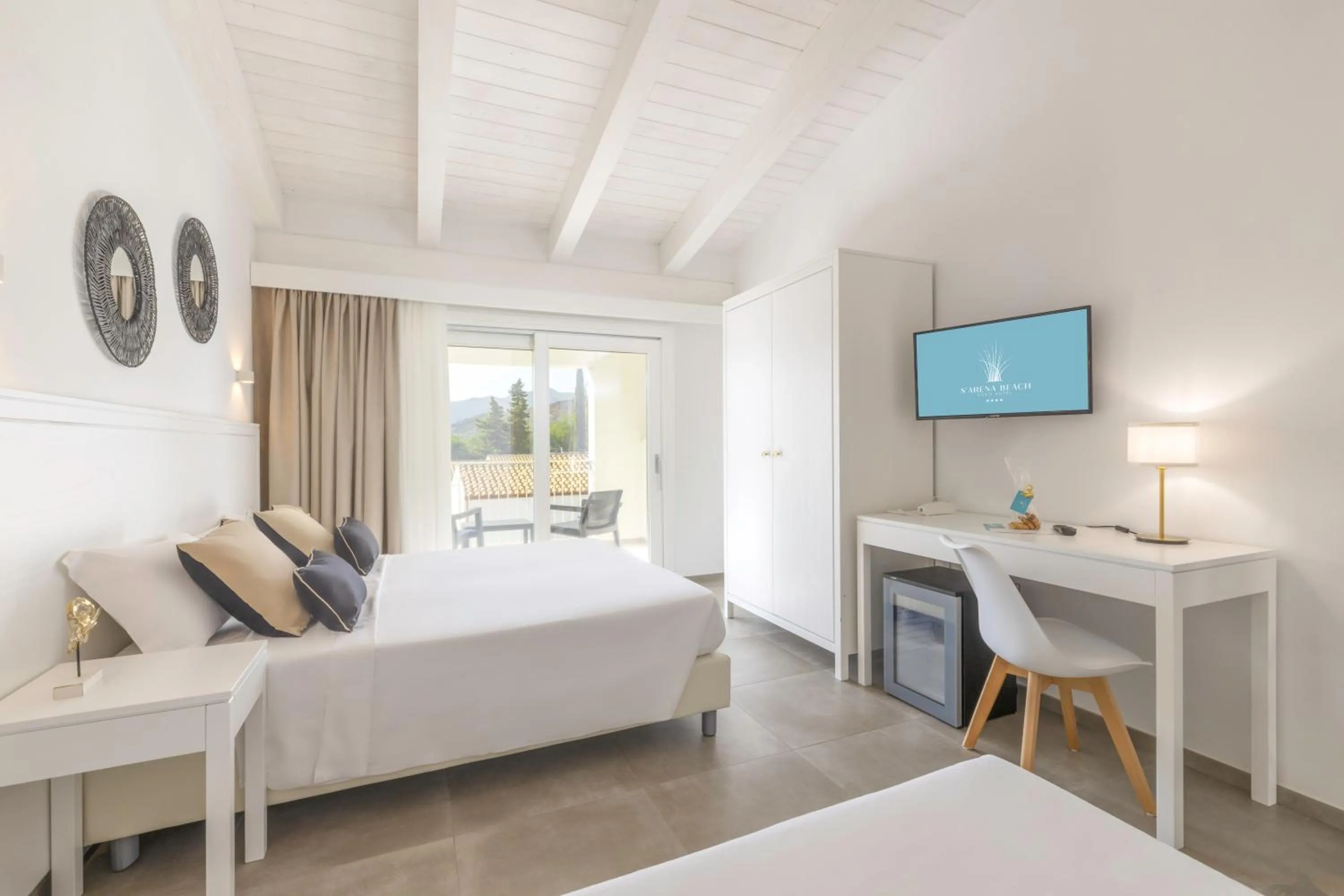 Bed in Hotel S'arena Beach