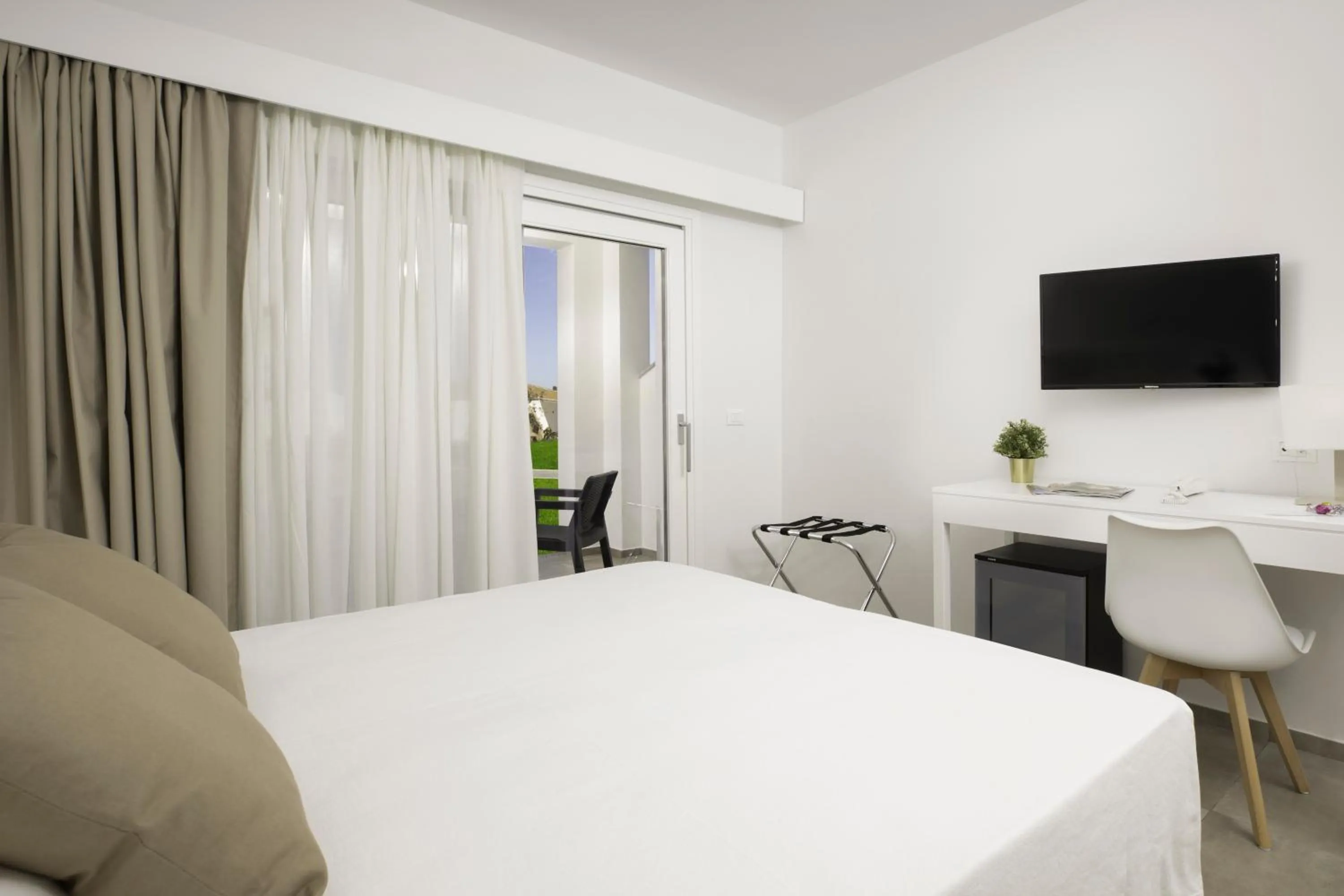 Bed in Hotel S'arena Beach