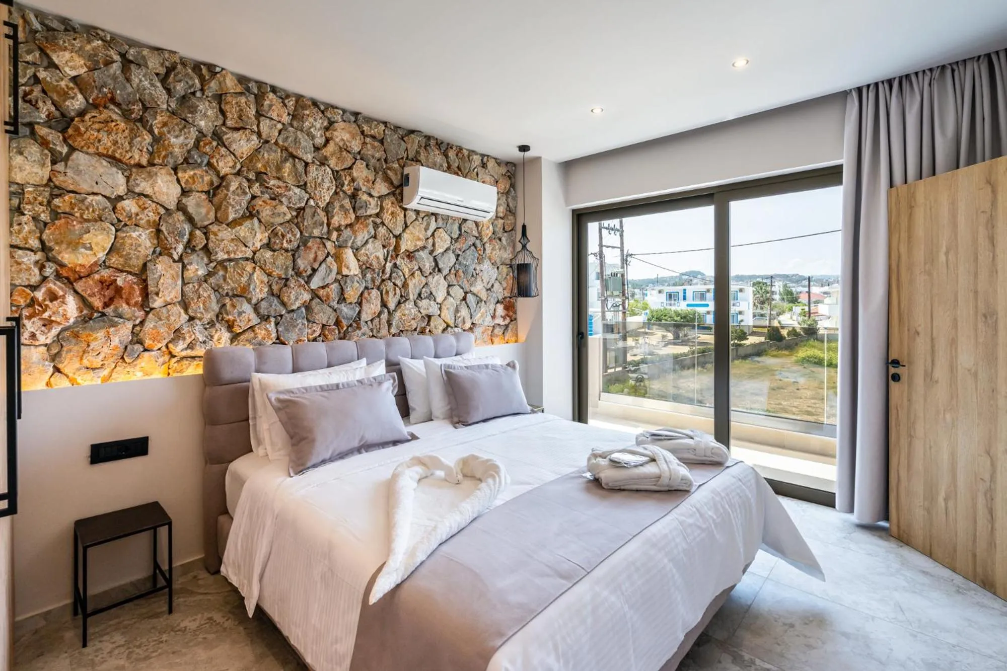 Bed in Pathos SeaSide Suites